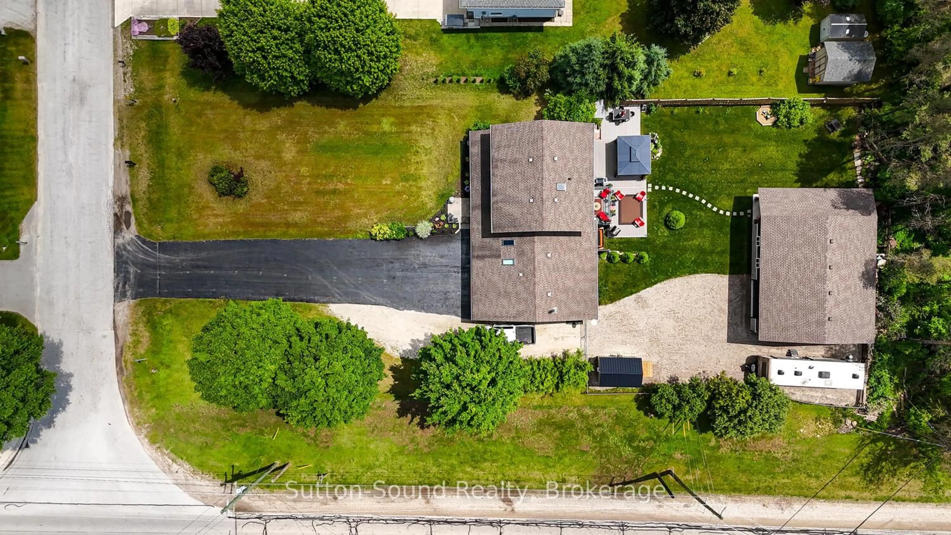 A pic from outside/outdoor area/front of a property/back of a property/a pic from drone, street for 35 Pine Tree Dr, South Bruce Peninsula Ontario N0H 1P0