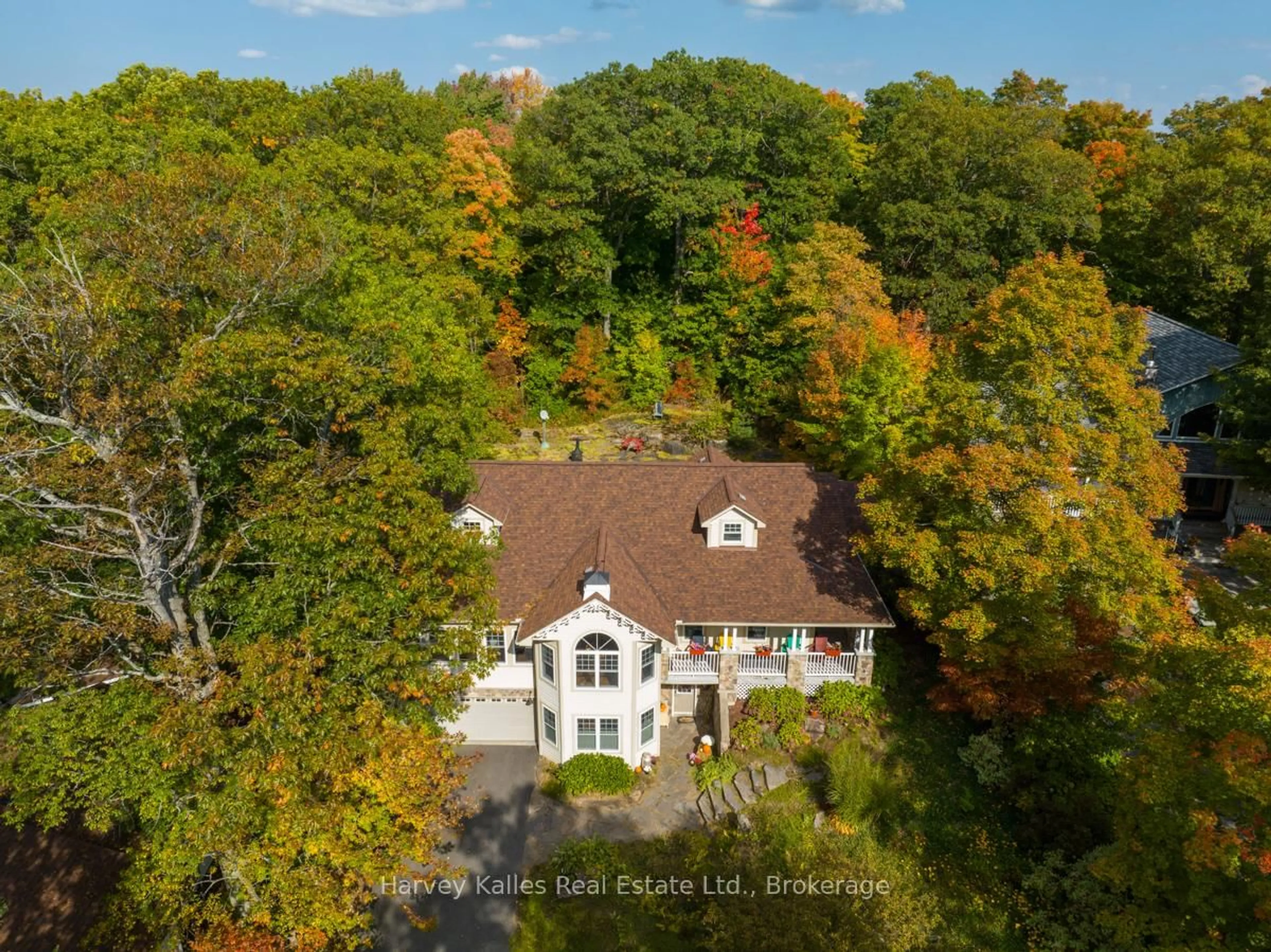 A pic from outside/outdoor area/front of a property/back of a property/a pic from drone, forest/trees view for 1039 Gordon St St, Muskoka Lakes Ontario P0C 1A0