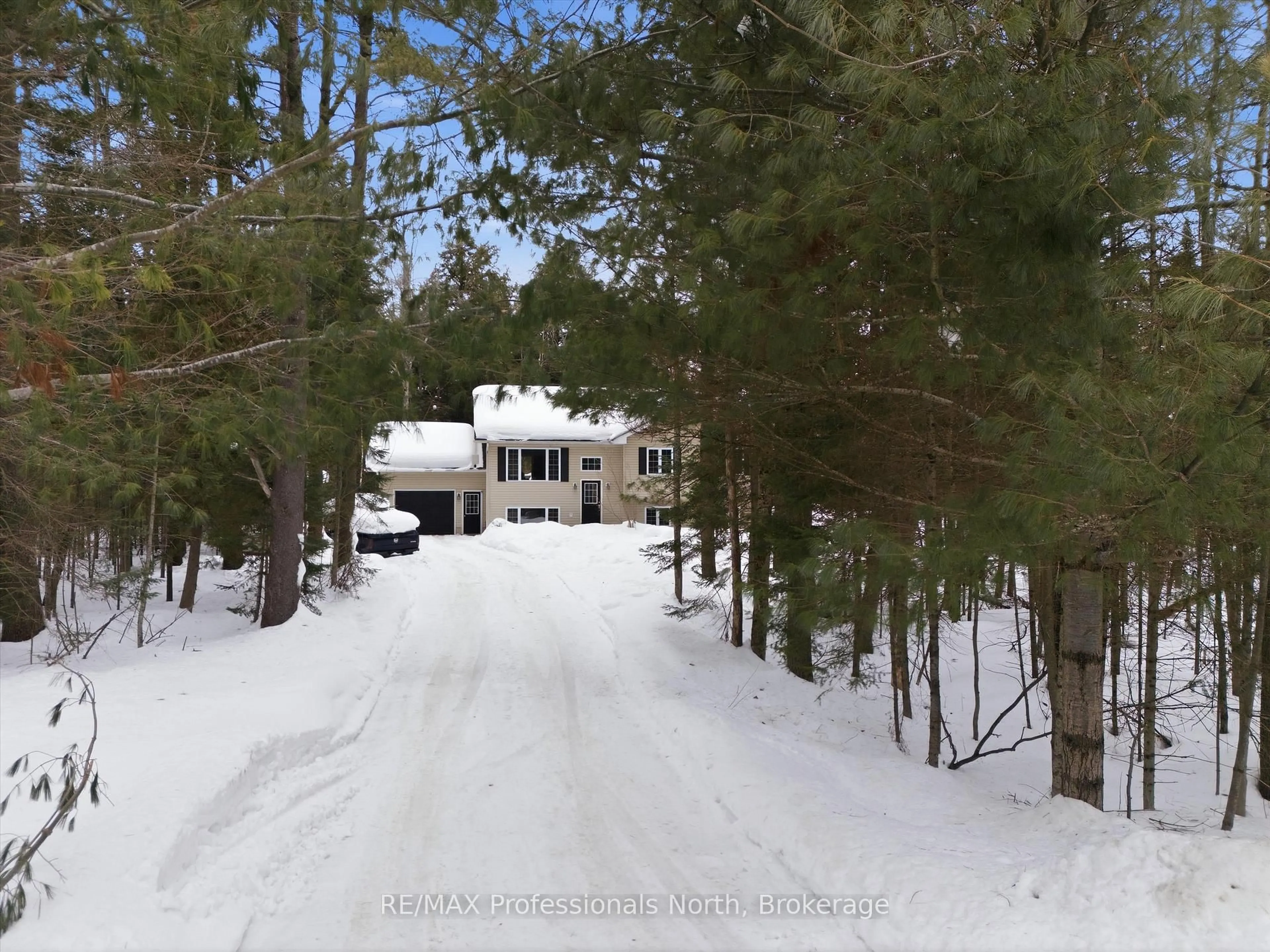 A pic from outside/outdoor area/front of a property/back of a property/a pic from drone, forest/trees view for 1017 CHURCH HILL Rd, Bracebridge Ontario P1L 1X1