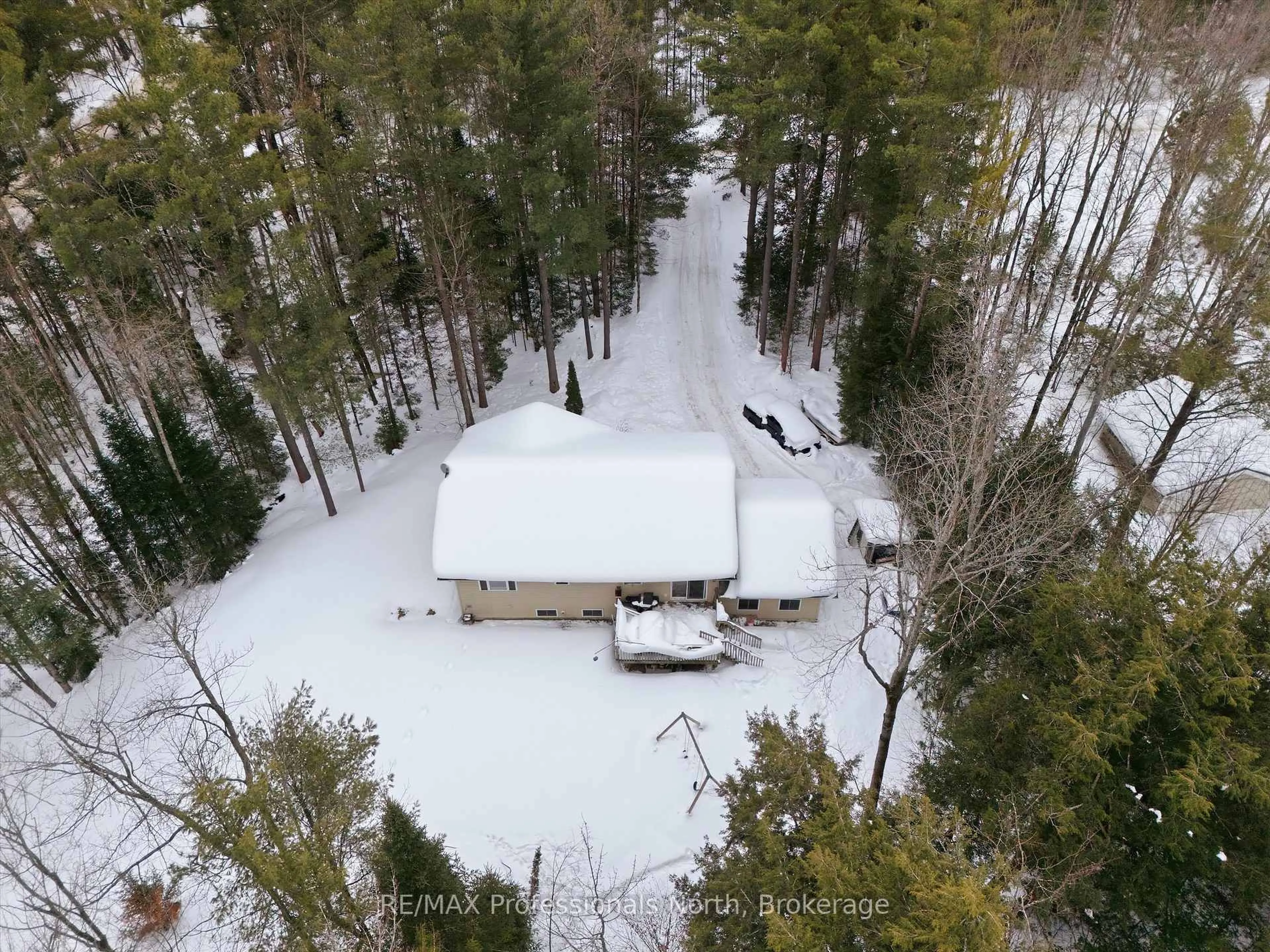 A pic from outside/outdoor area/front of a property/back of a property/a pic from drone, forest/trees view for 1017 CHURCH HILL Rd, Bracebridge Ontario P1L 1X1