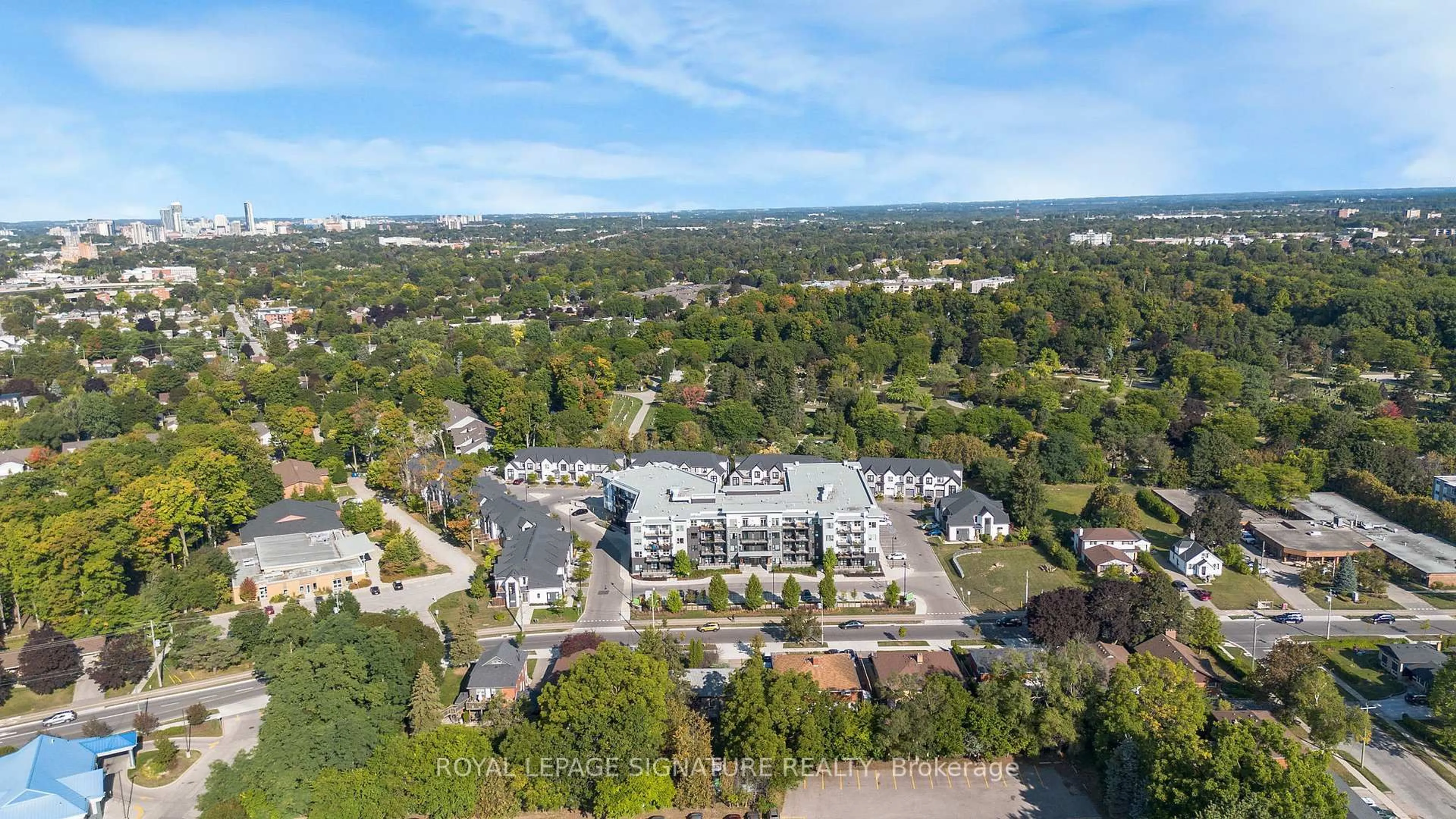 A pic from outside/outdoor area/front of a property/back of a property/a pic from drone, city buildings view from balcony for 110 Fergus Ave #211, Kitchener Ontario N2A 0K9