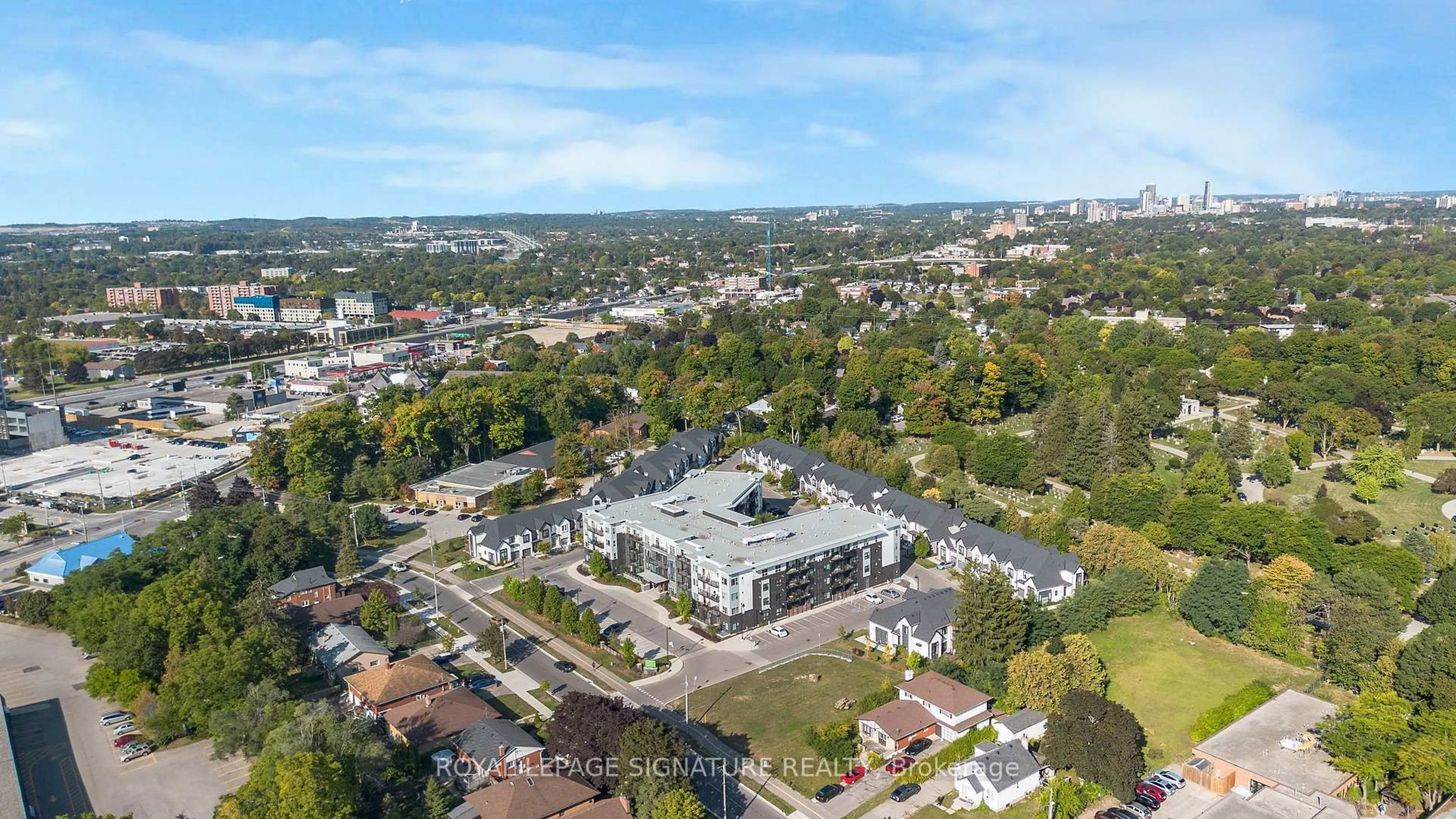 A pic from outside/outdoor area/front of a property/back of a property/a pic from drone, unknown for 110 Fergus Ave #211, Kitchener Ontario N2A 0K9