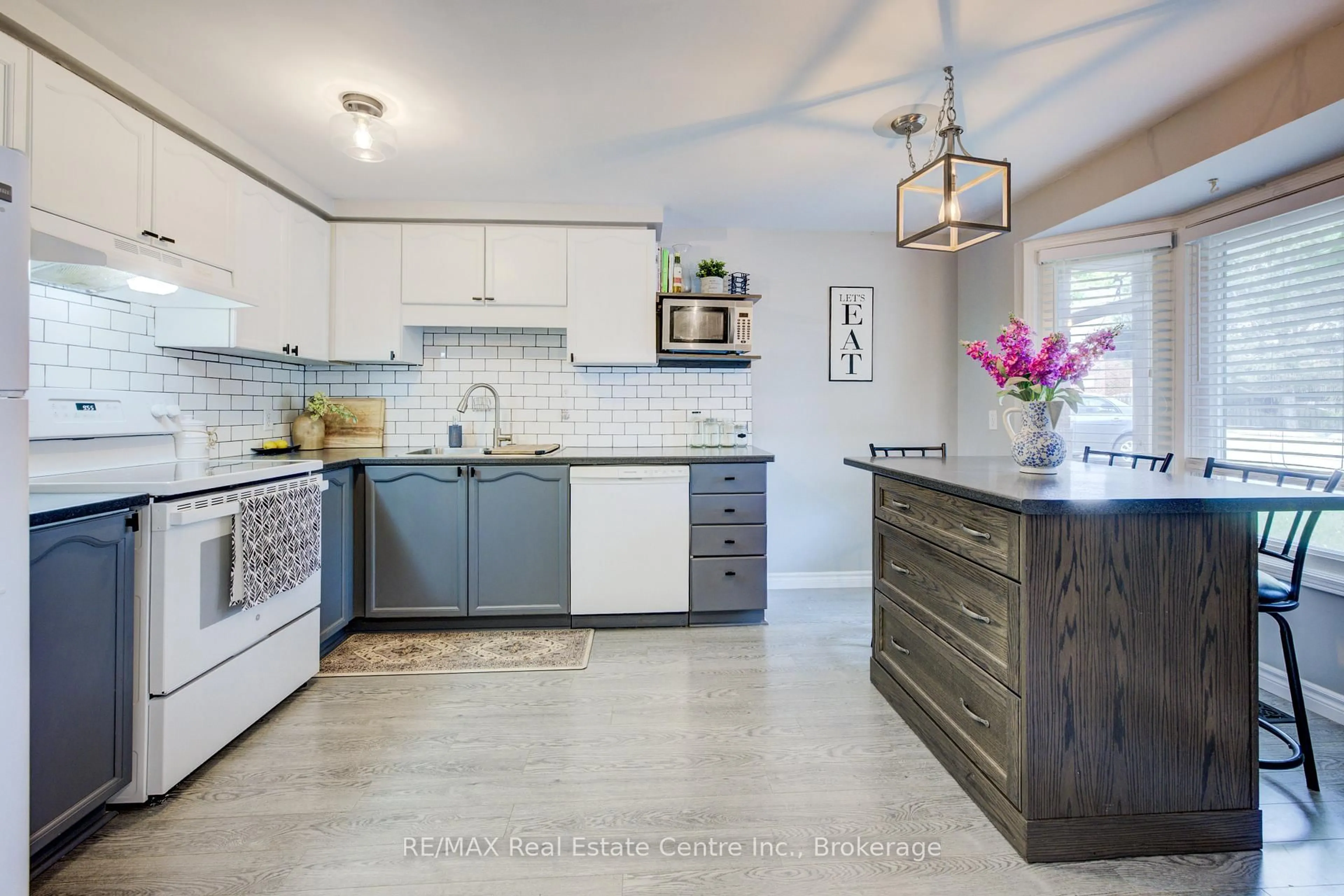 Open concept kitchen, ceramic/tile floor for 180 Marksam Rd #73, Guelph Ontario N1H 8G6