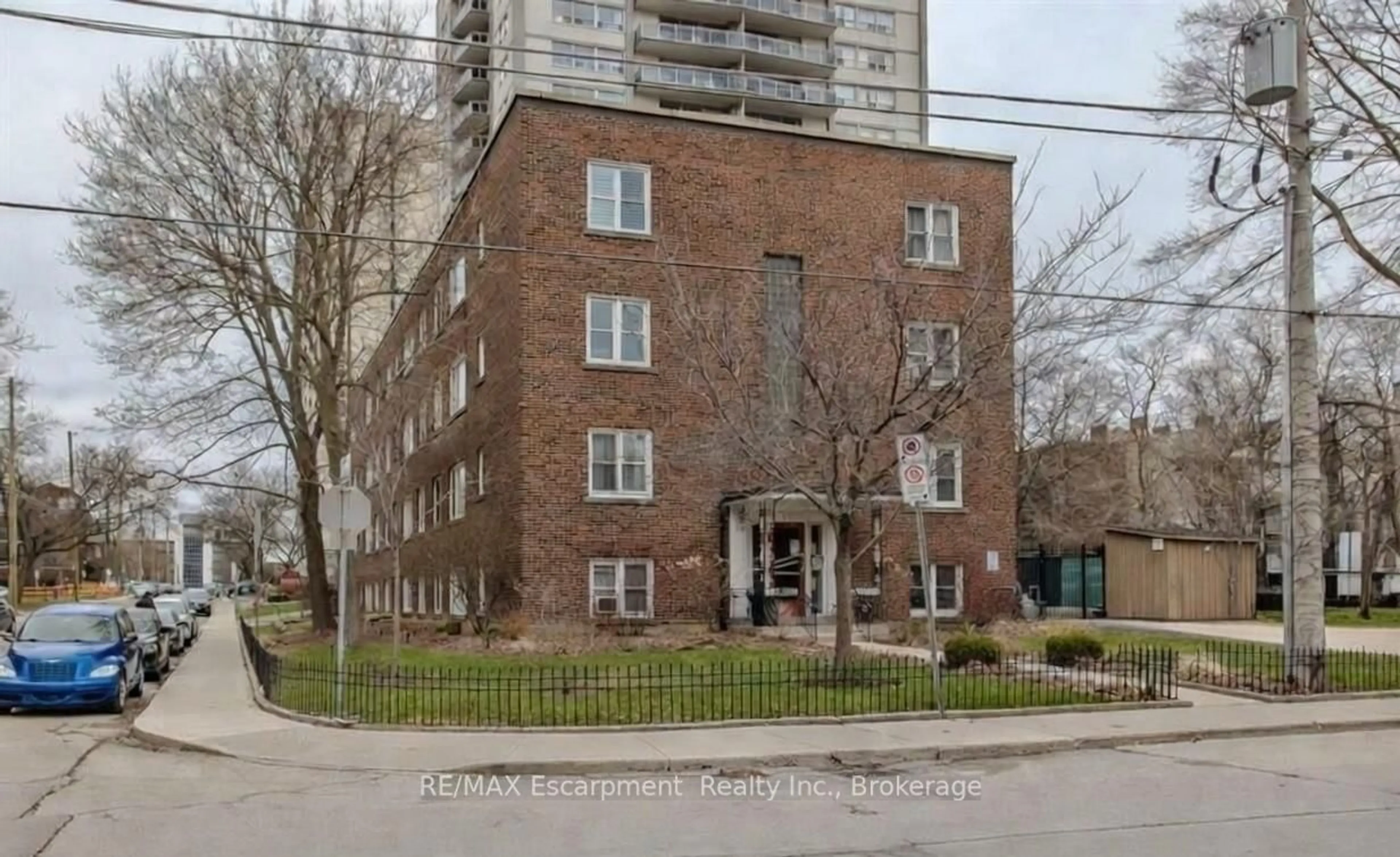 Home with brick exterior material, street for 60 Robinson St #305, Hamilton Ontario L8P 1Y9