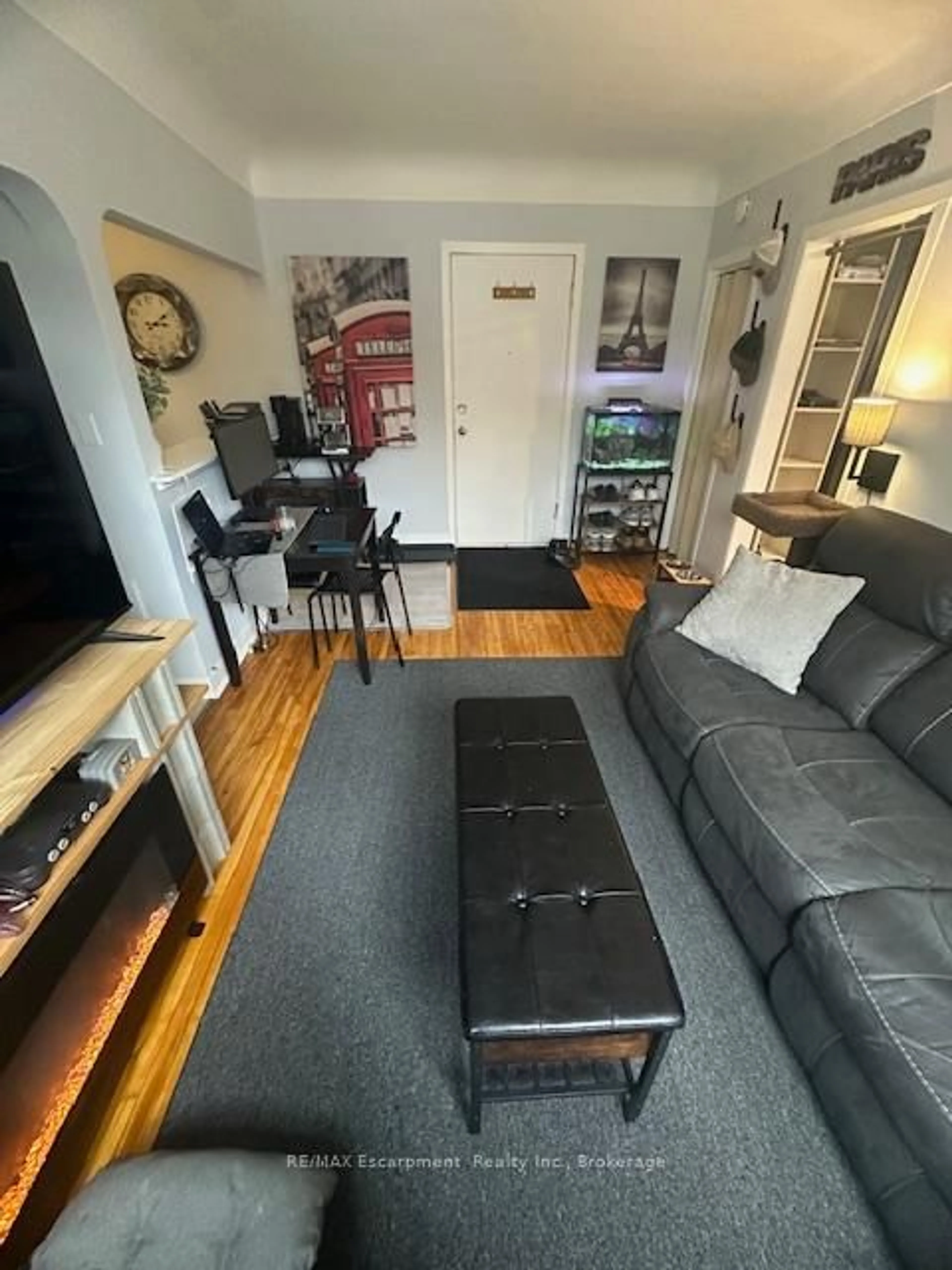 Living room with furniture, unknown for 60 Robinson St #305, Hamilton Ontario L8P 1Y9
