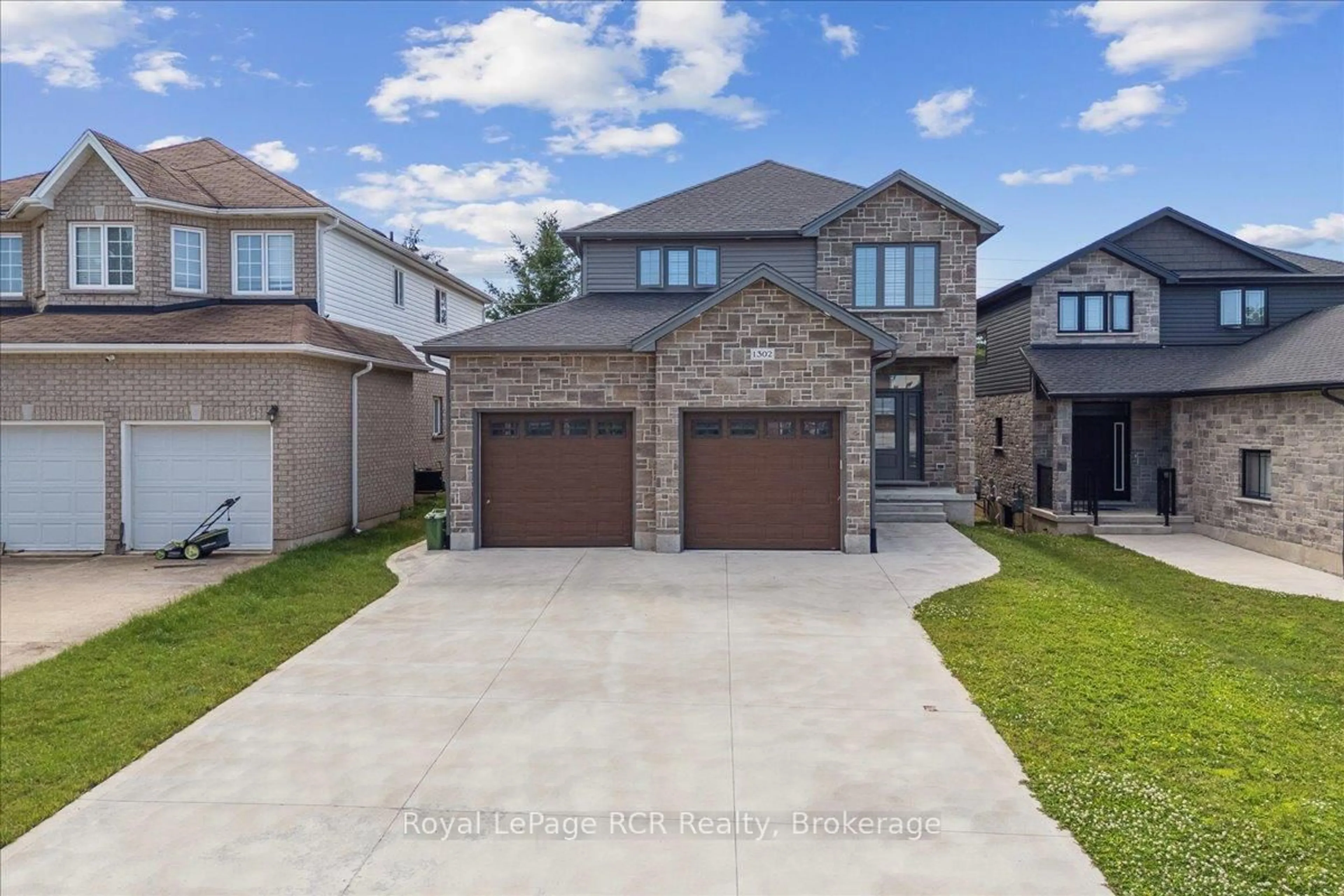 Home with brick exterior material, street for 1302 14th Ave, Owen Sound Ontario N4K 0A1