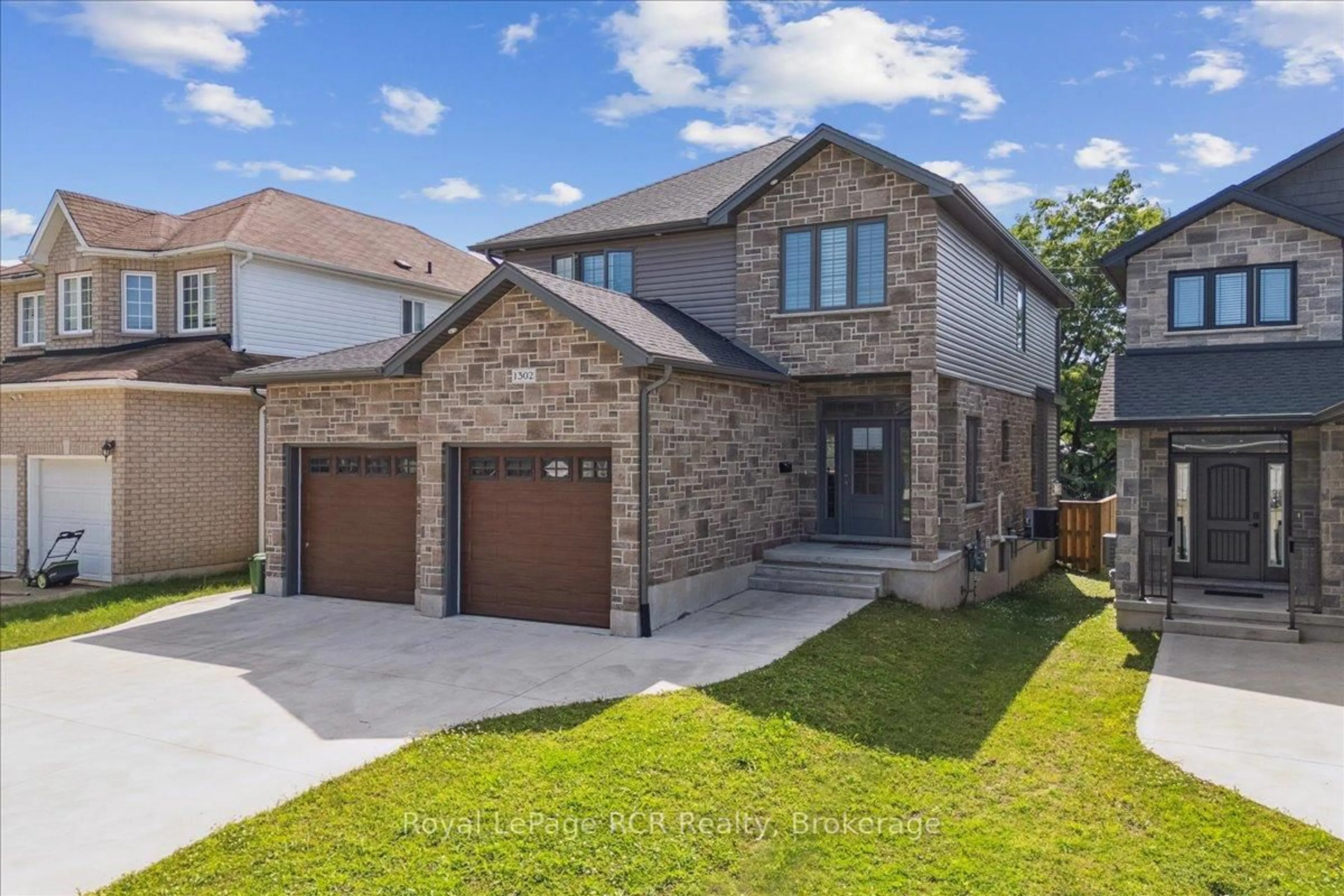 Home with brick exterior material, street for 1302 14th Ave, Owen Sound Ontario N4K 0A1