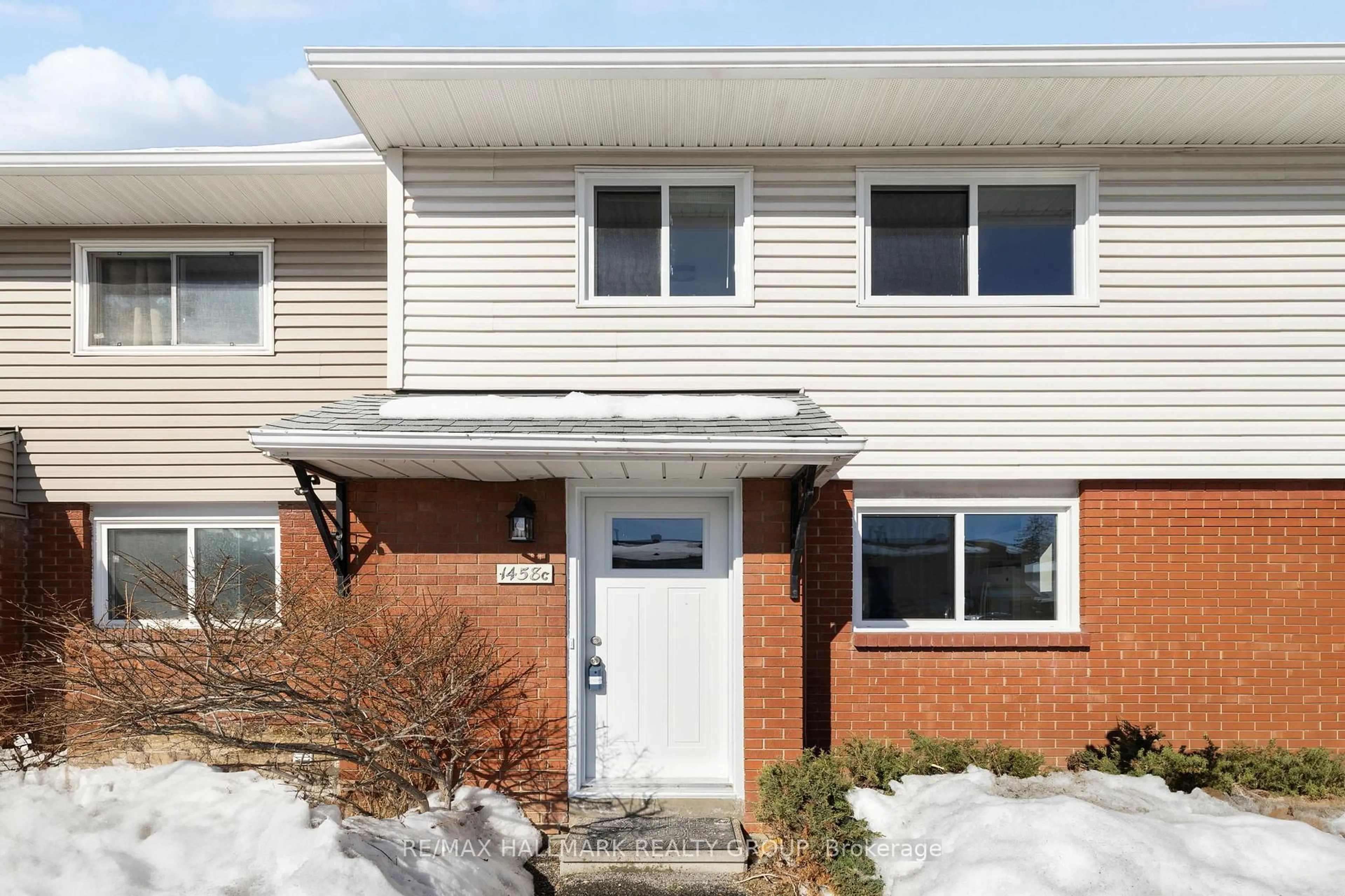 Home with brick exterior material, street for 1458 Heatherington Rd #C, Ottawa Ontario K1V 6S1