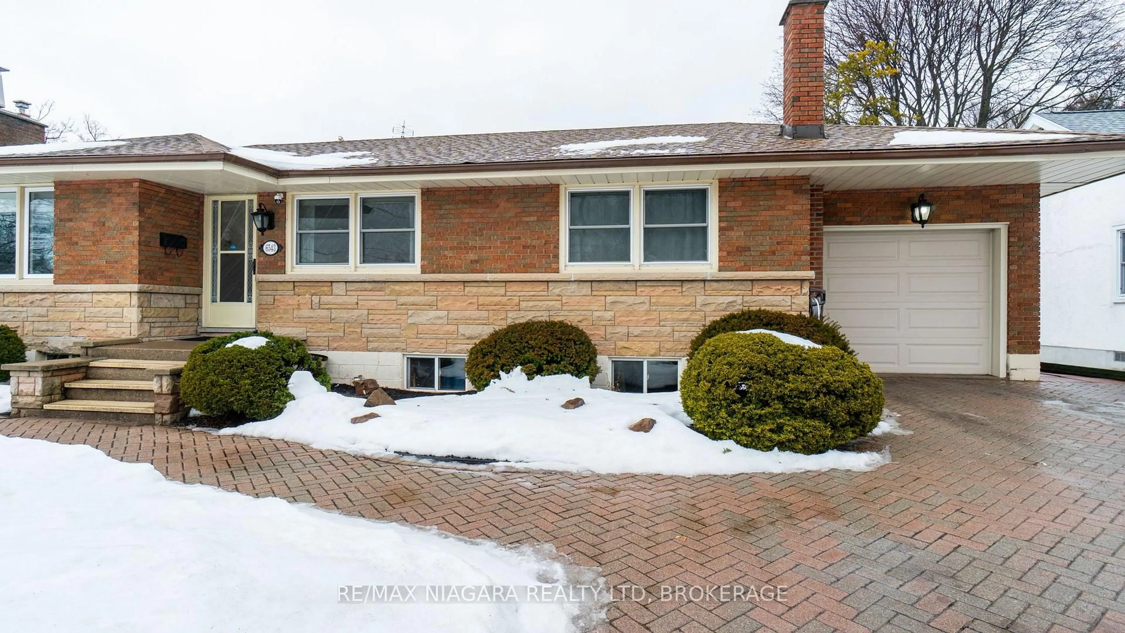 Home with brick exterior material, street for 6543 ST. JOHN St, Niagara Falls Ontario L2J 1C8