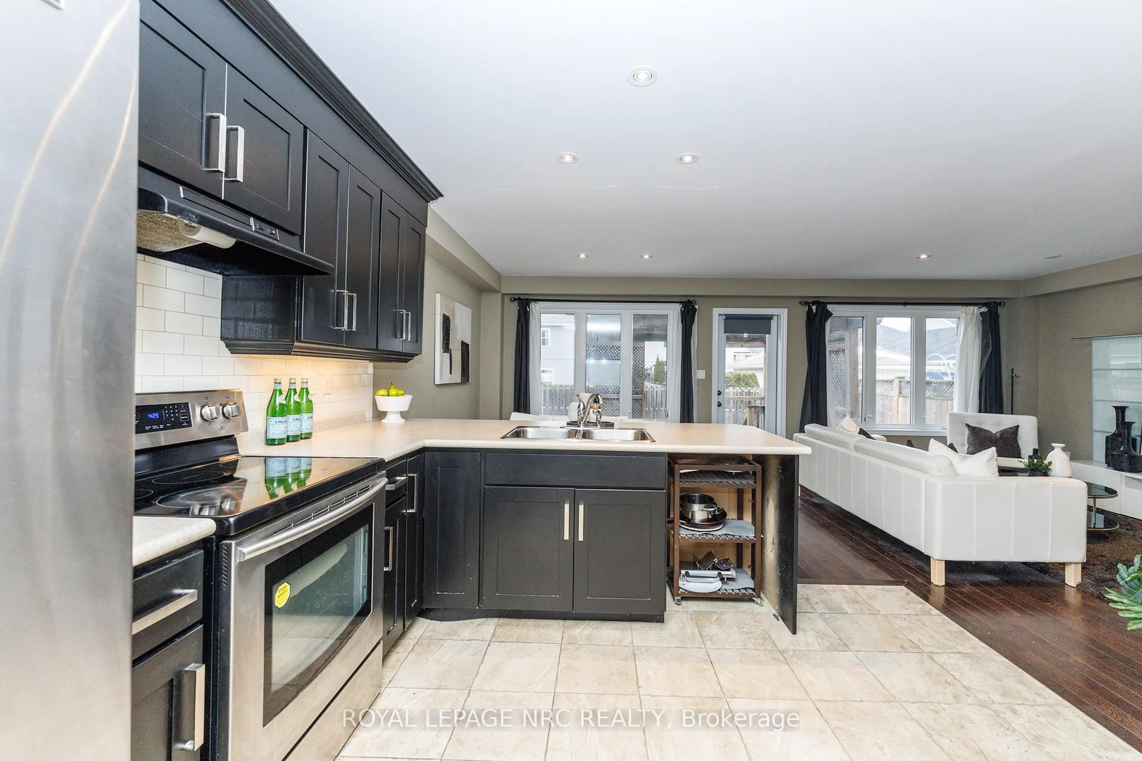 Open concept kitchen, ceramic/tile floor for 61 Haig St, St. Catharines Ontario L2R 6K7