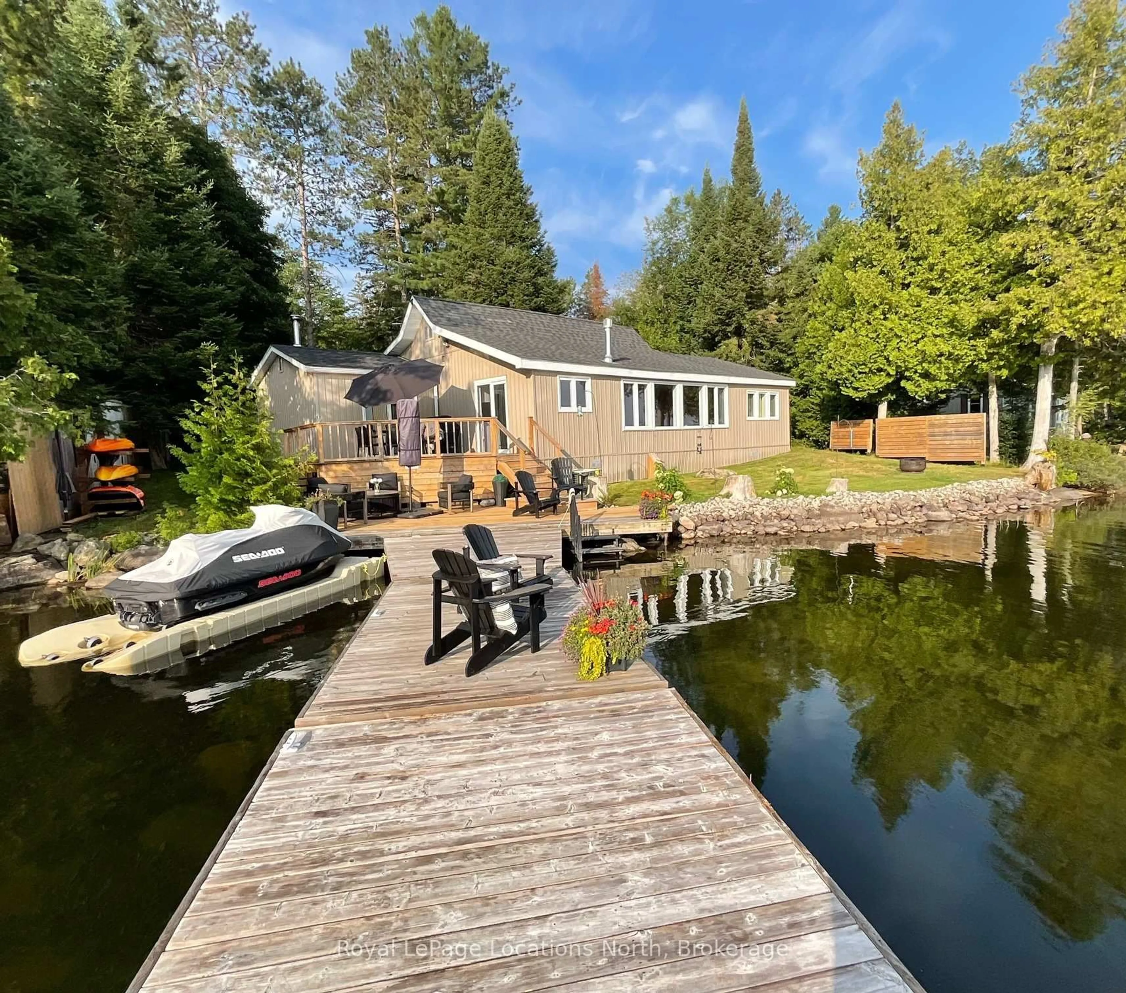 A pic from outside/outdoor area/front of a property/back of a property/a pic from drone, water/lake/river/ocean view for 1433 South Horn Lk Rd, Ryerson Ontario P0A 1C0