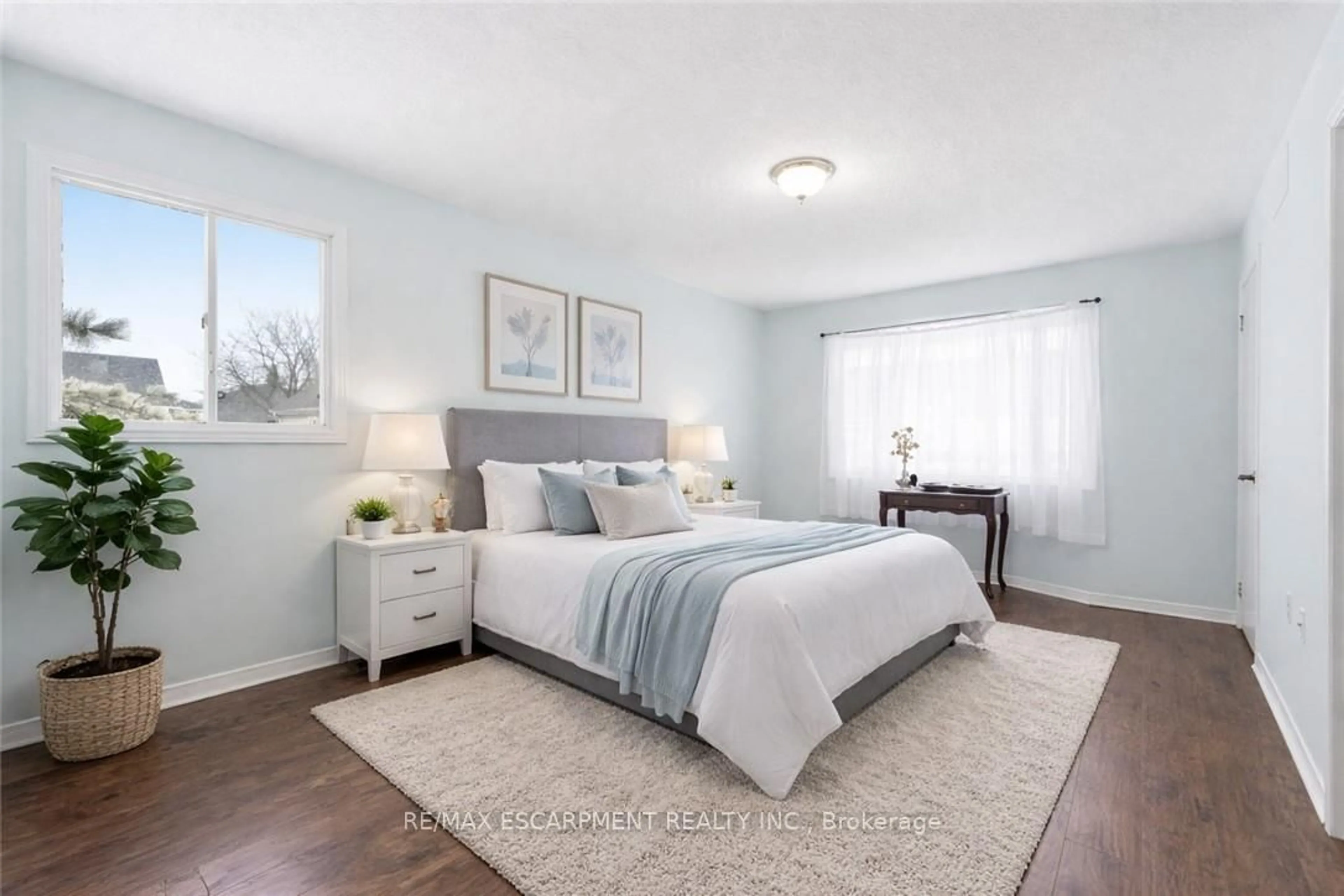 Bedroom with bed, wood/laminate floor for 360 Silverbirch Blvd, Hamilton Ontario L0R 1W0