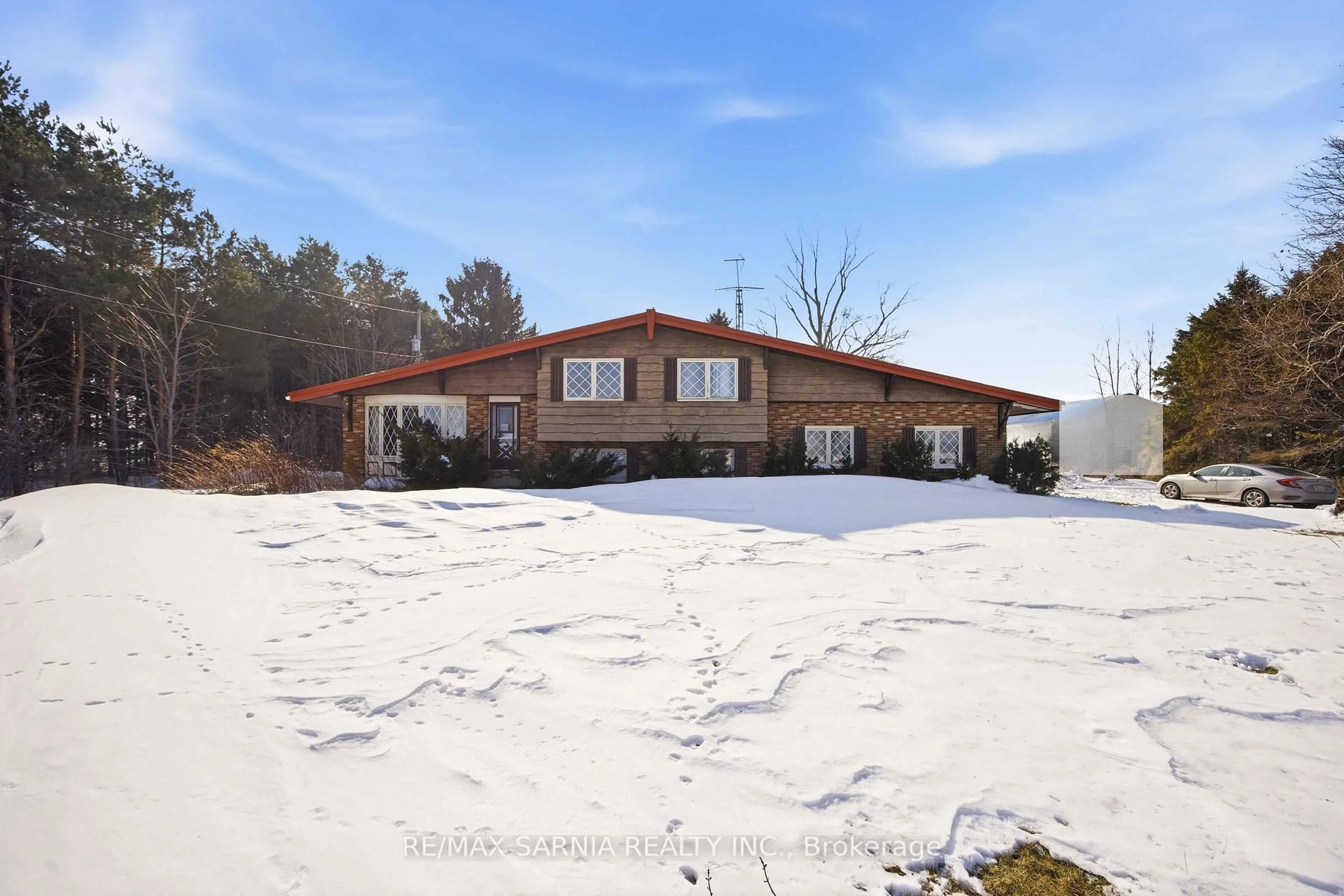 A pic from outside/outdoor area/front of a property/back of a property/a pic from drone, unknown for 4473 Aberarder Line, Plympton-Wyoming Ontario N0N 1J5