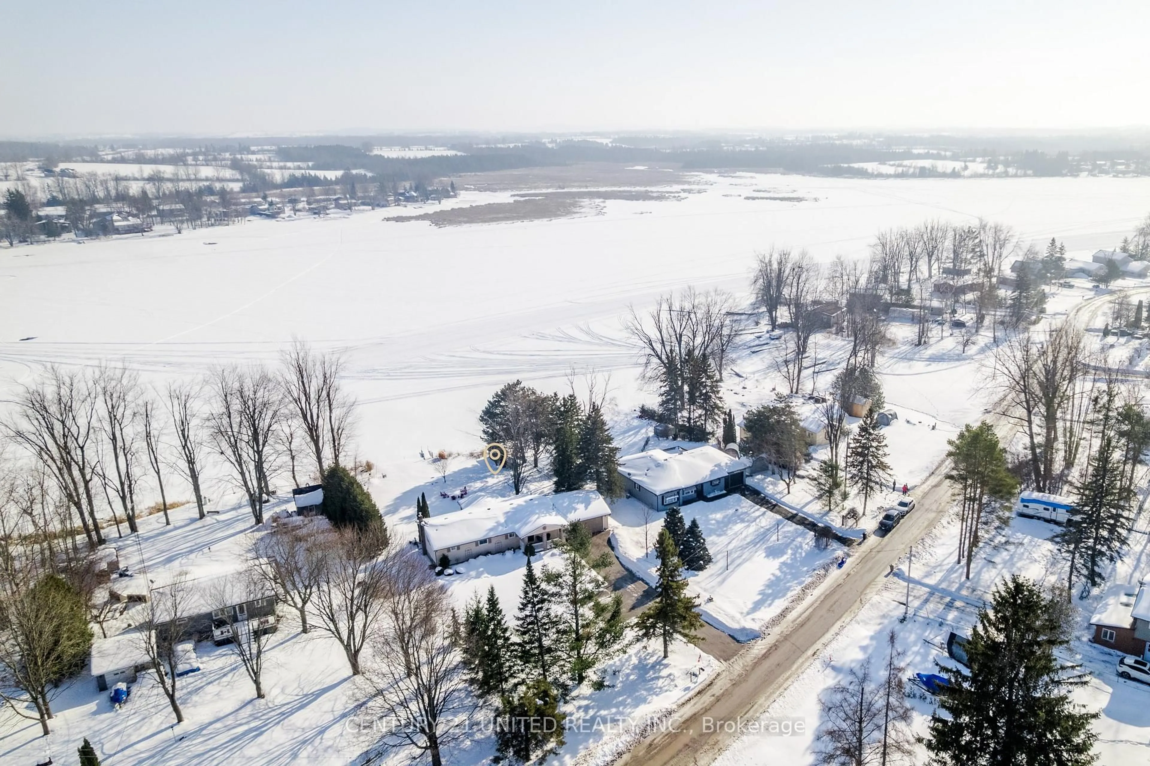 A pic from outside/outdoor area/front of a property/back of a property/a pic from drone, water/lake/river/ocean view for 1 Lakeshore Blvd, Selwyn Ontario K0L 1T0