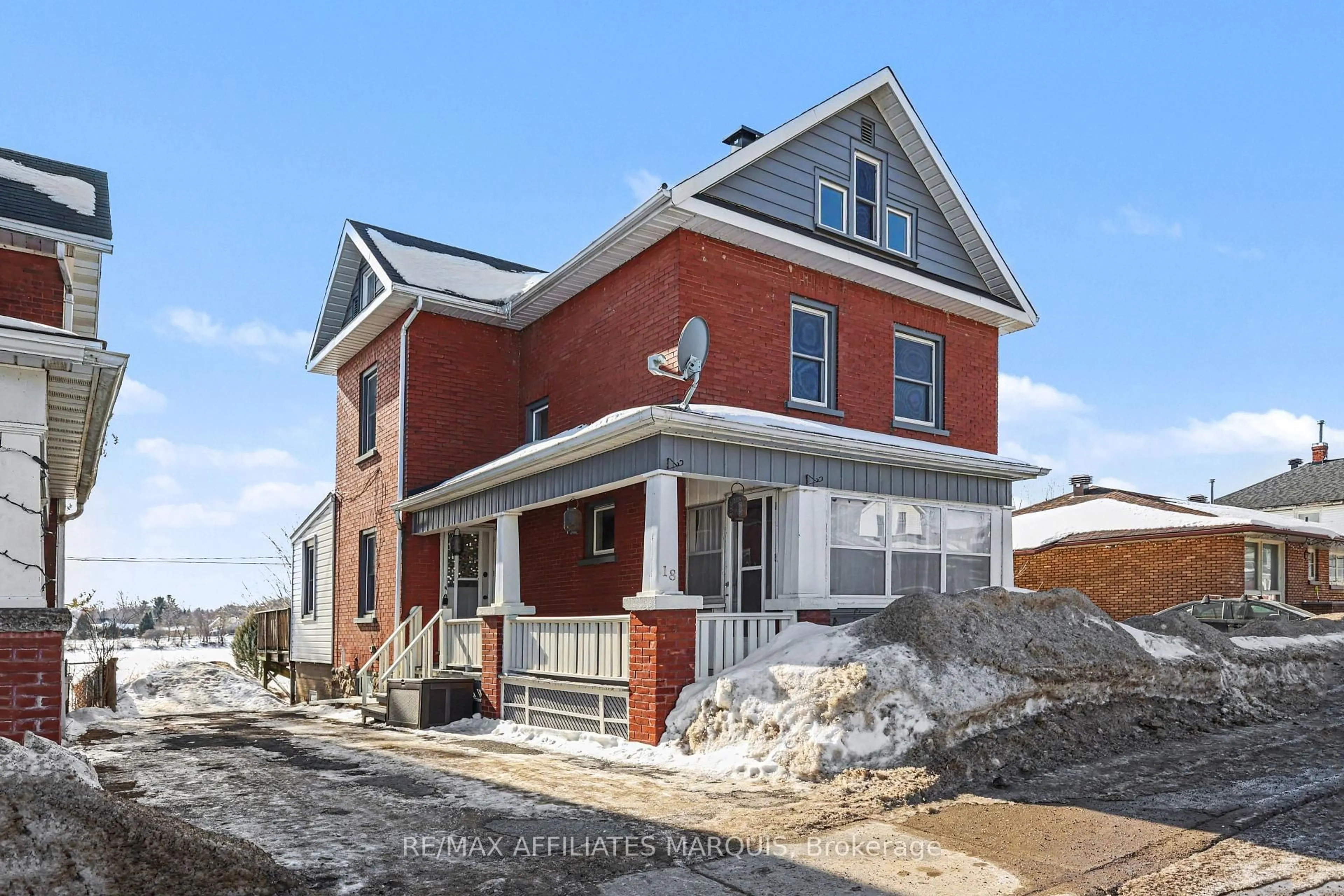 Home with brick exterior material, street for 18 Queen St, Smiths Falls Ontario K7A 3N2