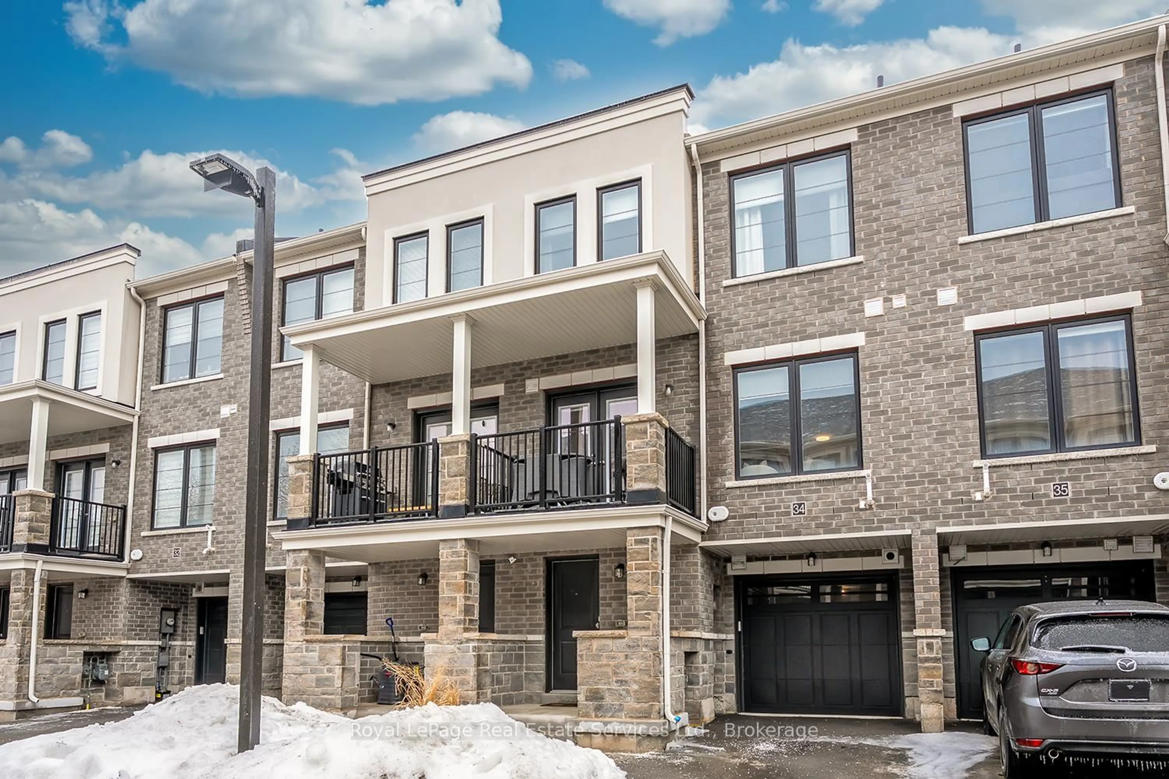 Home with brick exterior material, street for 383 Dundas St #34, Hamilton Ontario L8B 1X6