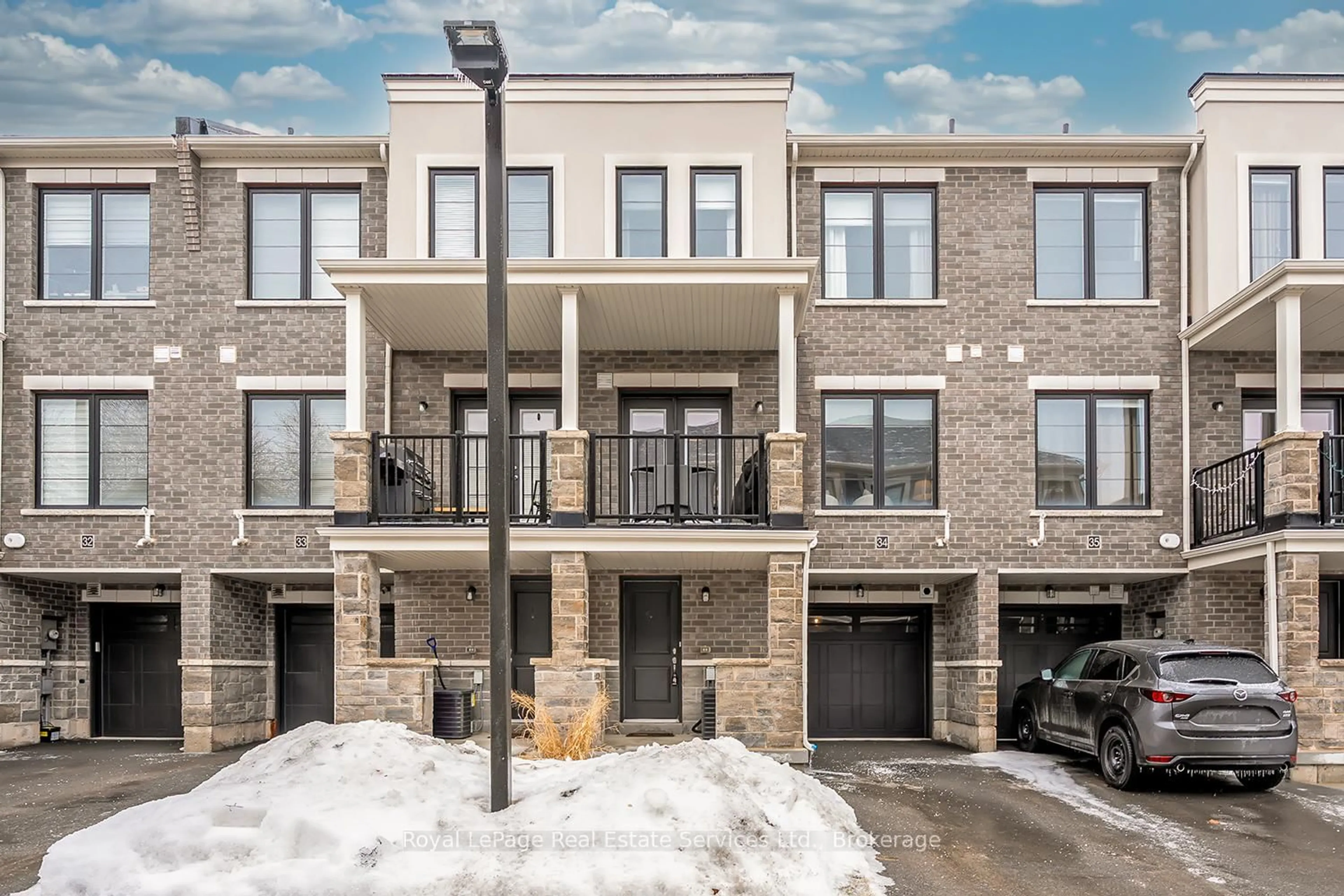 Home with brick exterior material, street for 383 Dundas St #34, Hamilton Ontario L8B 1X6