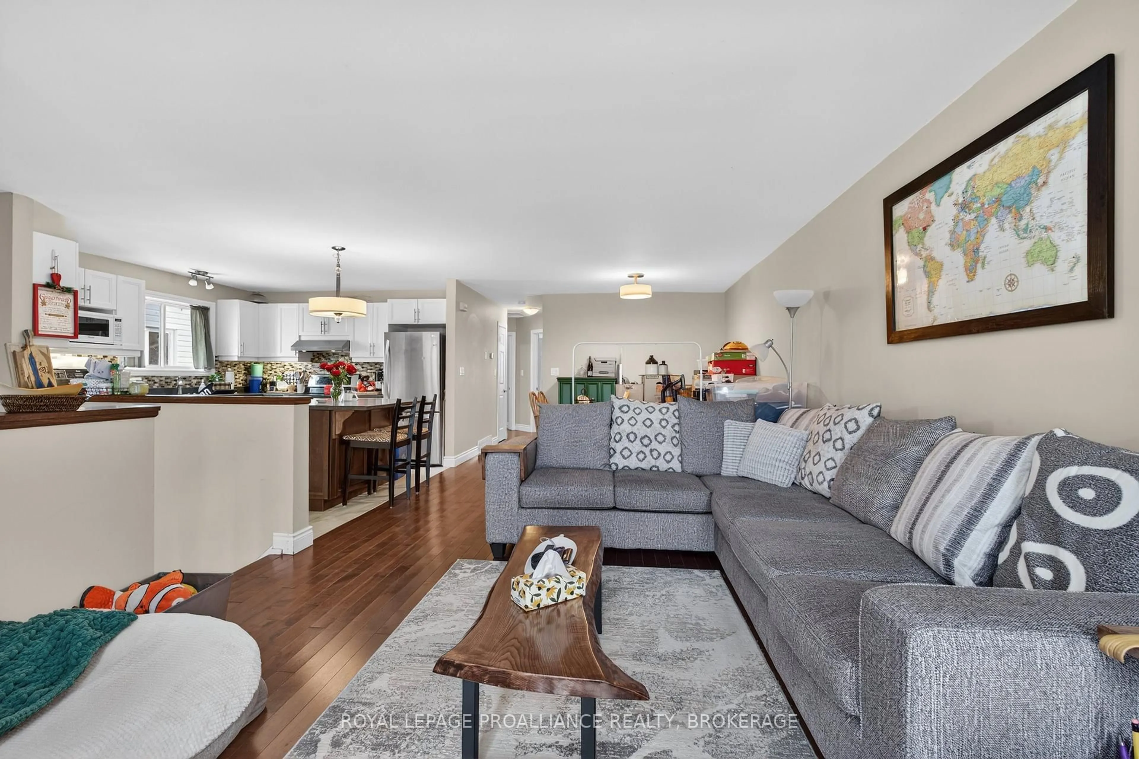 Living room with furniture, wood/laminate floor for 614 Barnsley Cres, Kingston Ontario K7M 8X4