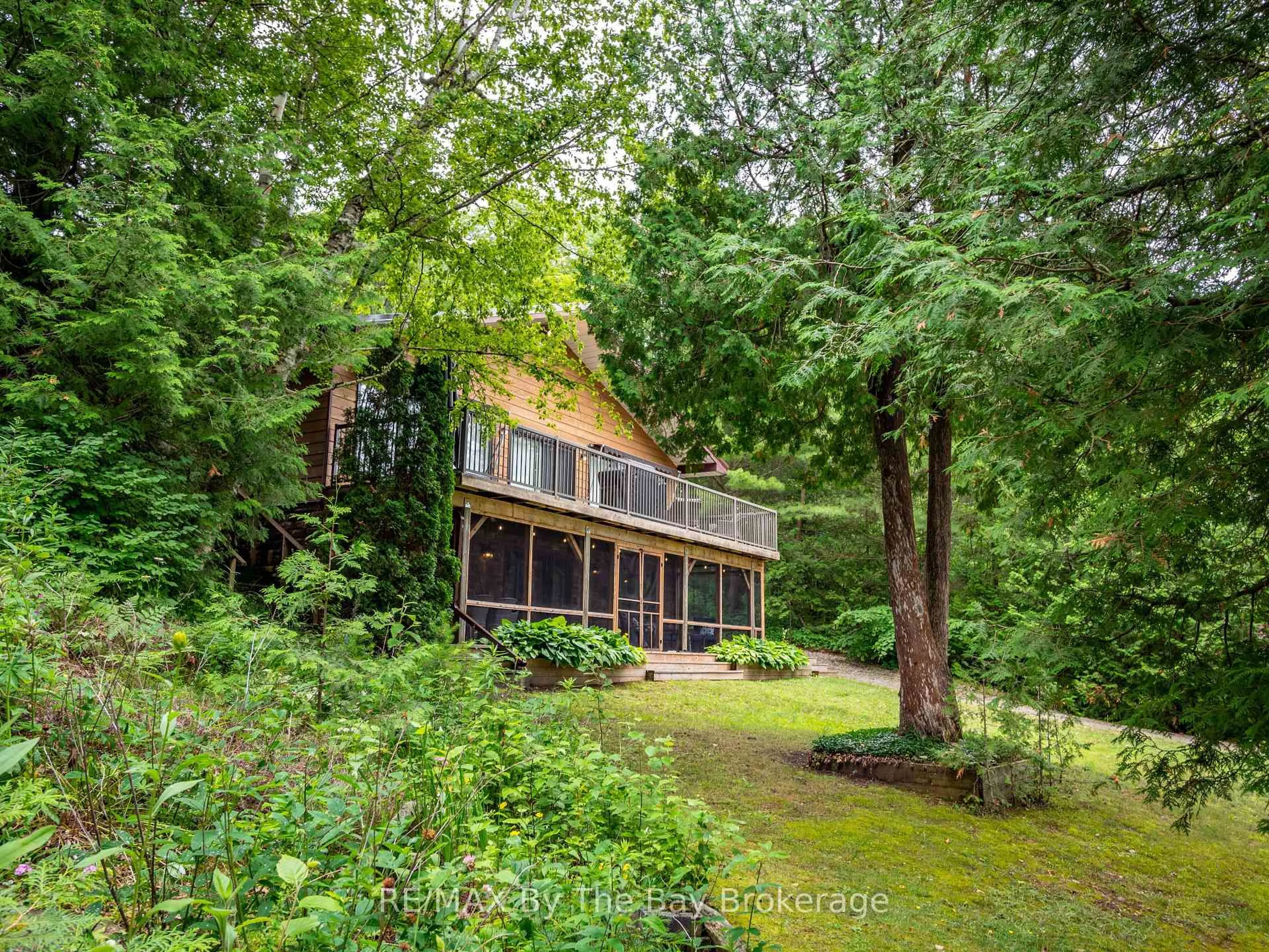 A pic from outside/outdoor area/front of a property/back of a property/a pic from drone, forest/trees view for 4018 Island 980 / Deer Island, Georgian Bay Ontario P0E 1E0