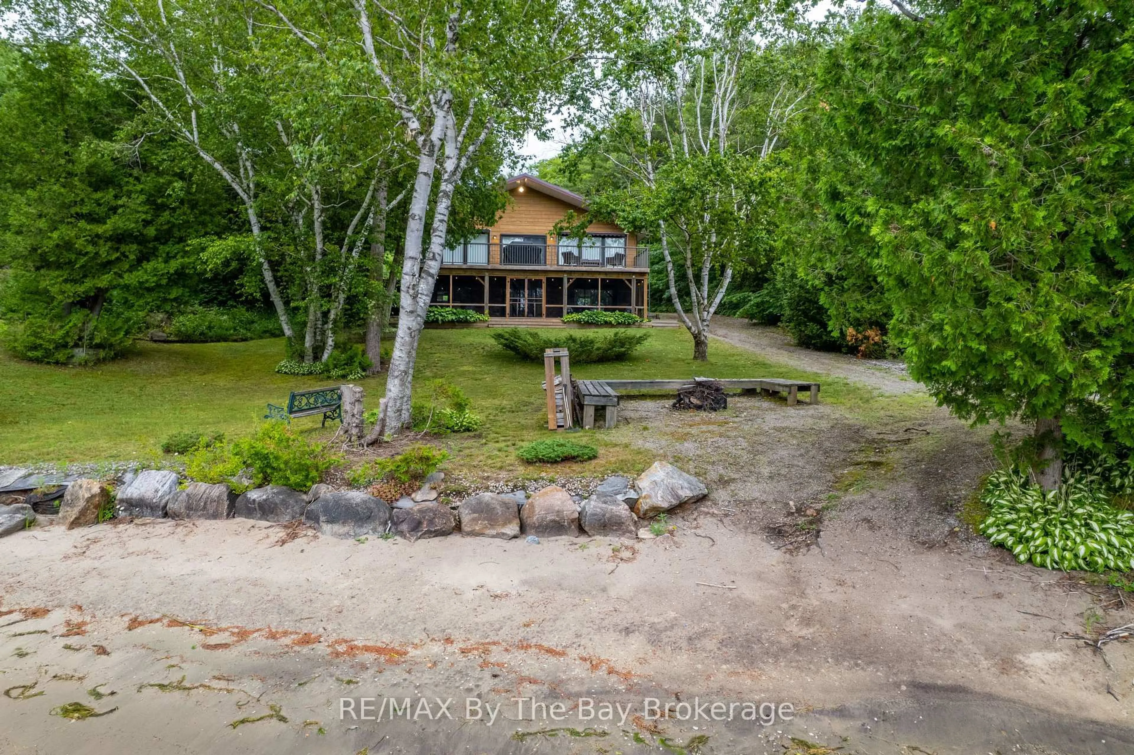 A pic from outside/outdoor area/front of a property/back of a property/a pic from drone, water/lake/river/ocean view for 4018 Island 980 / Deer Island, Georgian Bay Ontario P0E 1E0