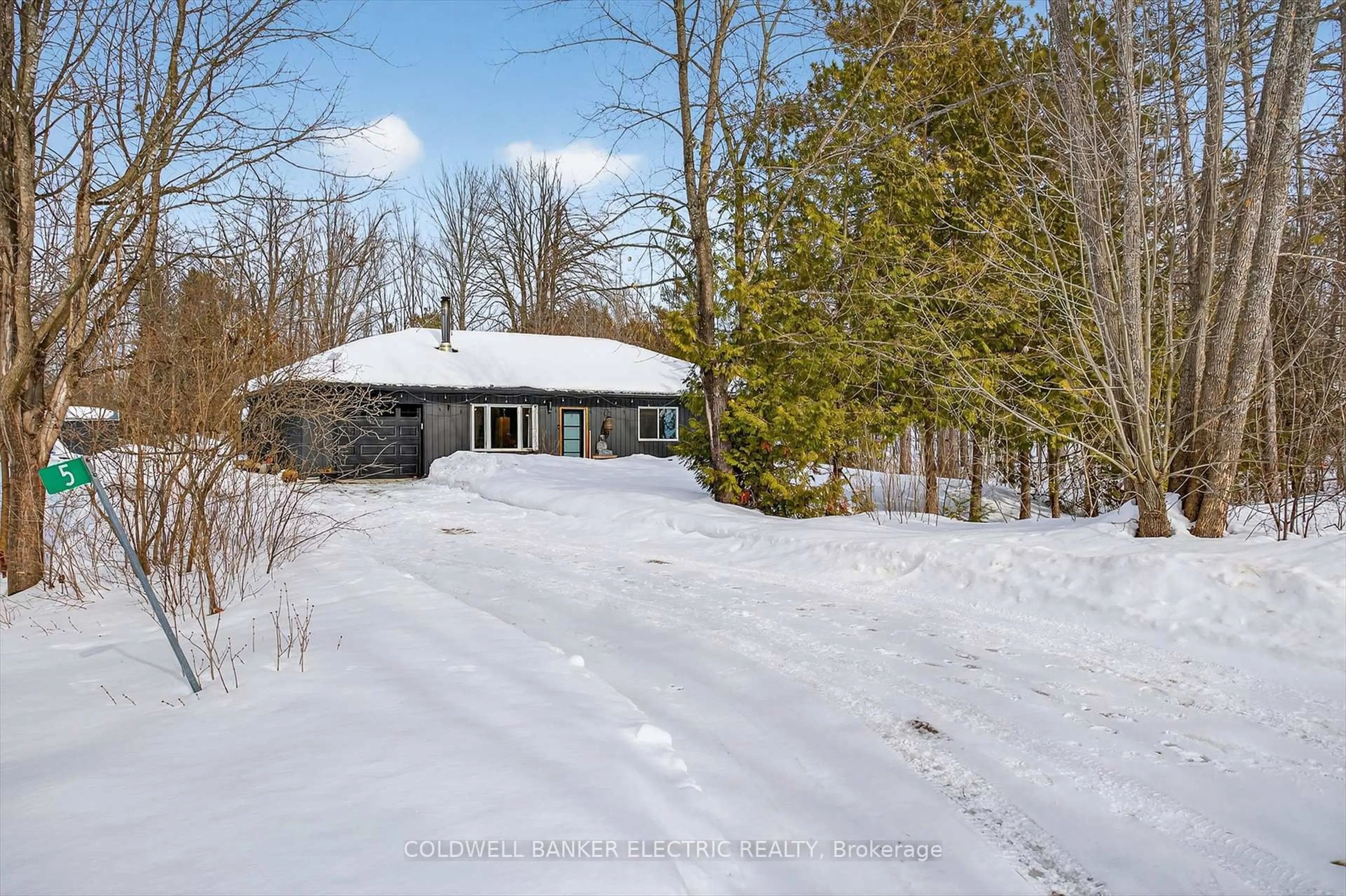 A pic from outside/outdoor area/front of a property/back of a property/a pic from drone, unknown for 5 Fire Route 60, Trent Lakes Ontario K0L 1J0