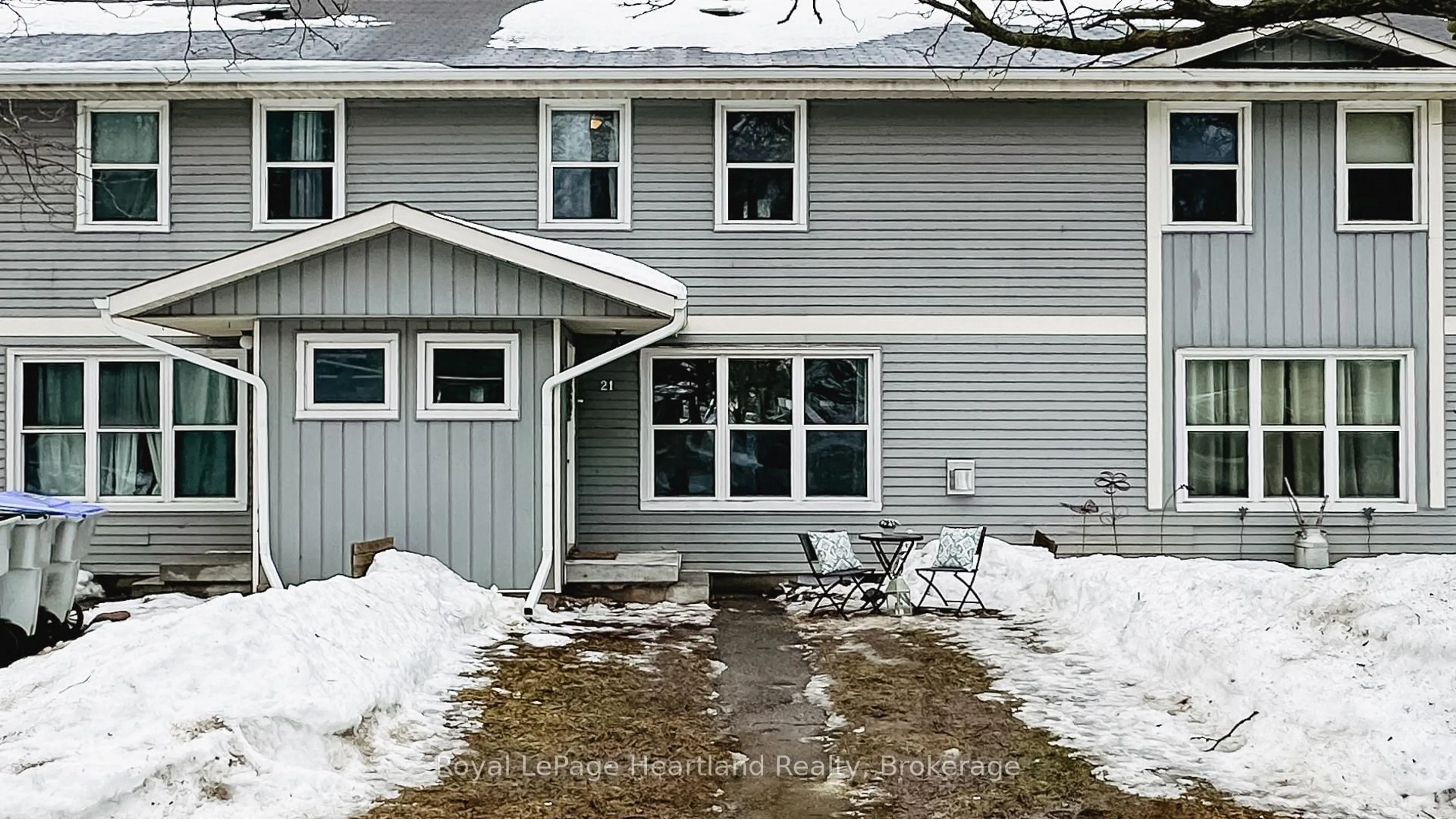 Home with vinyl exterior material, street for 21 St Charles Pl, Huron East Ontario N0M 1L0