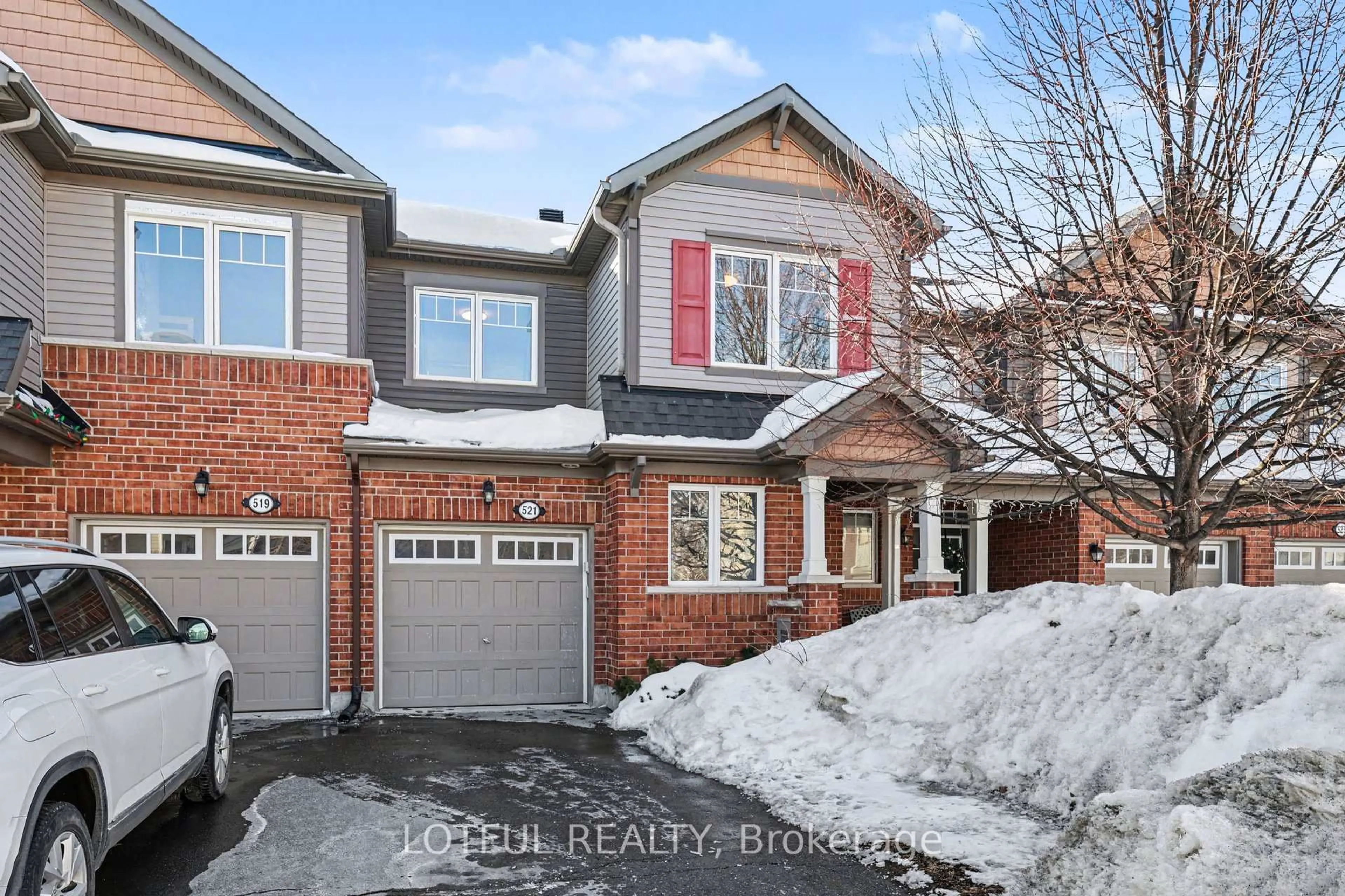 Home with brick exterior material, street for 521 Foxlight Circ, Ottawa Ontario K2M 0L9