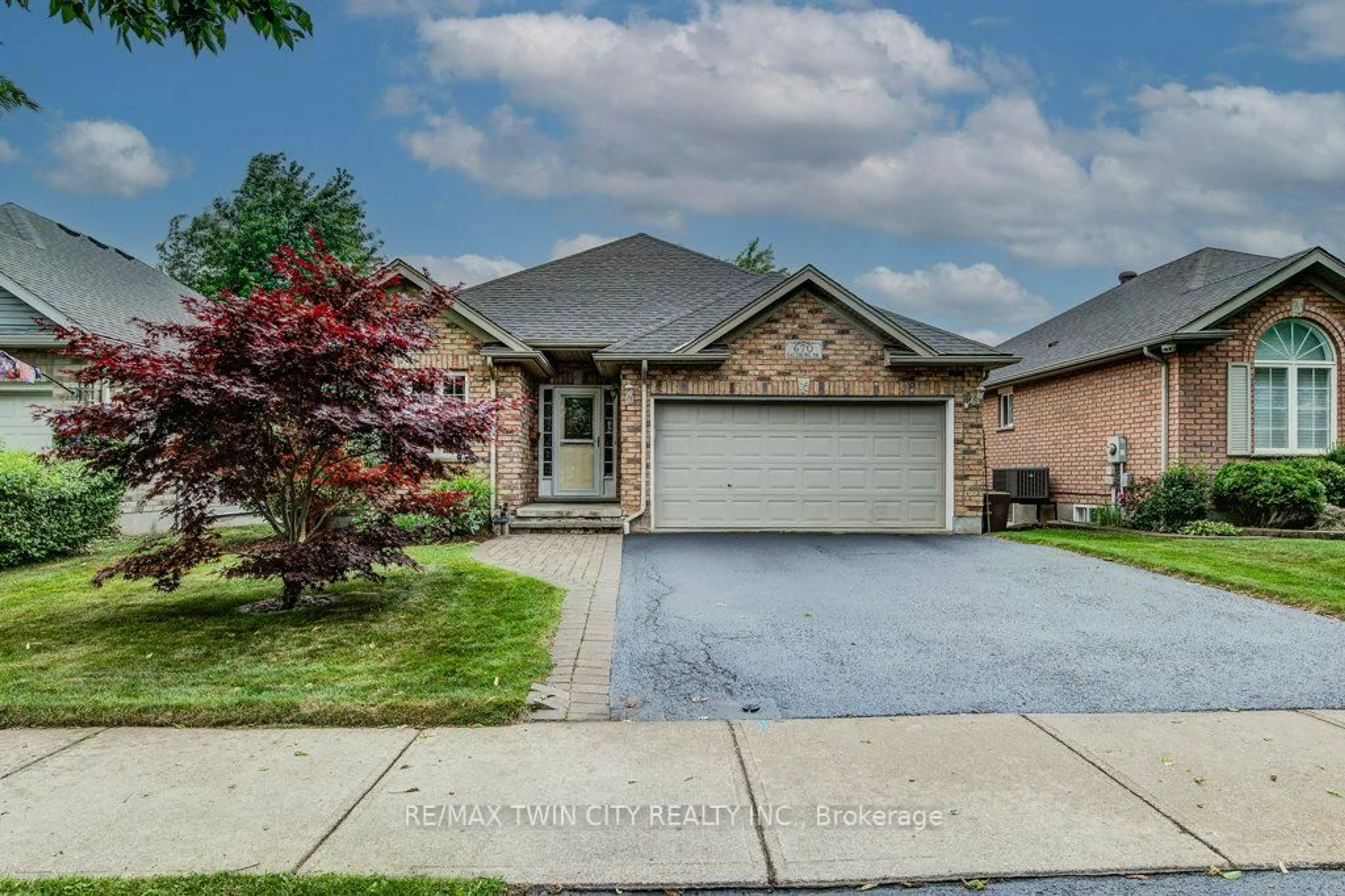 Home with brick exterior material, street for 670 Salzburg Dr, Waterloo Ontario N2V 2N8