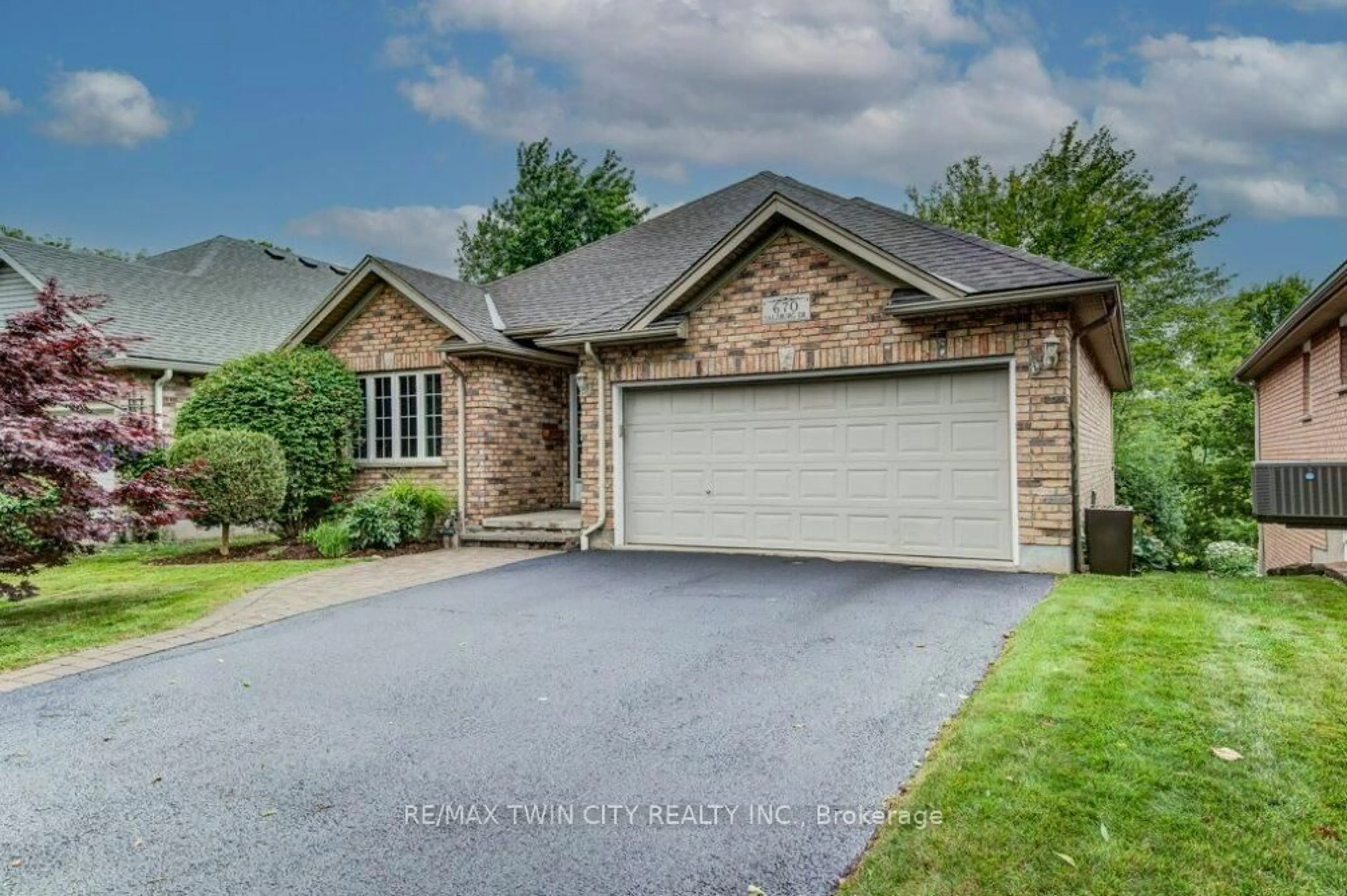 Home with brick exterior material, street for 670 Salzburg Dr, Waterloo Ontario N2V 2N8