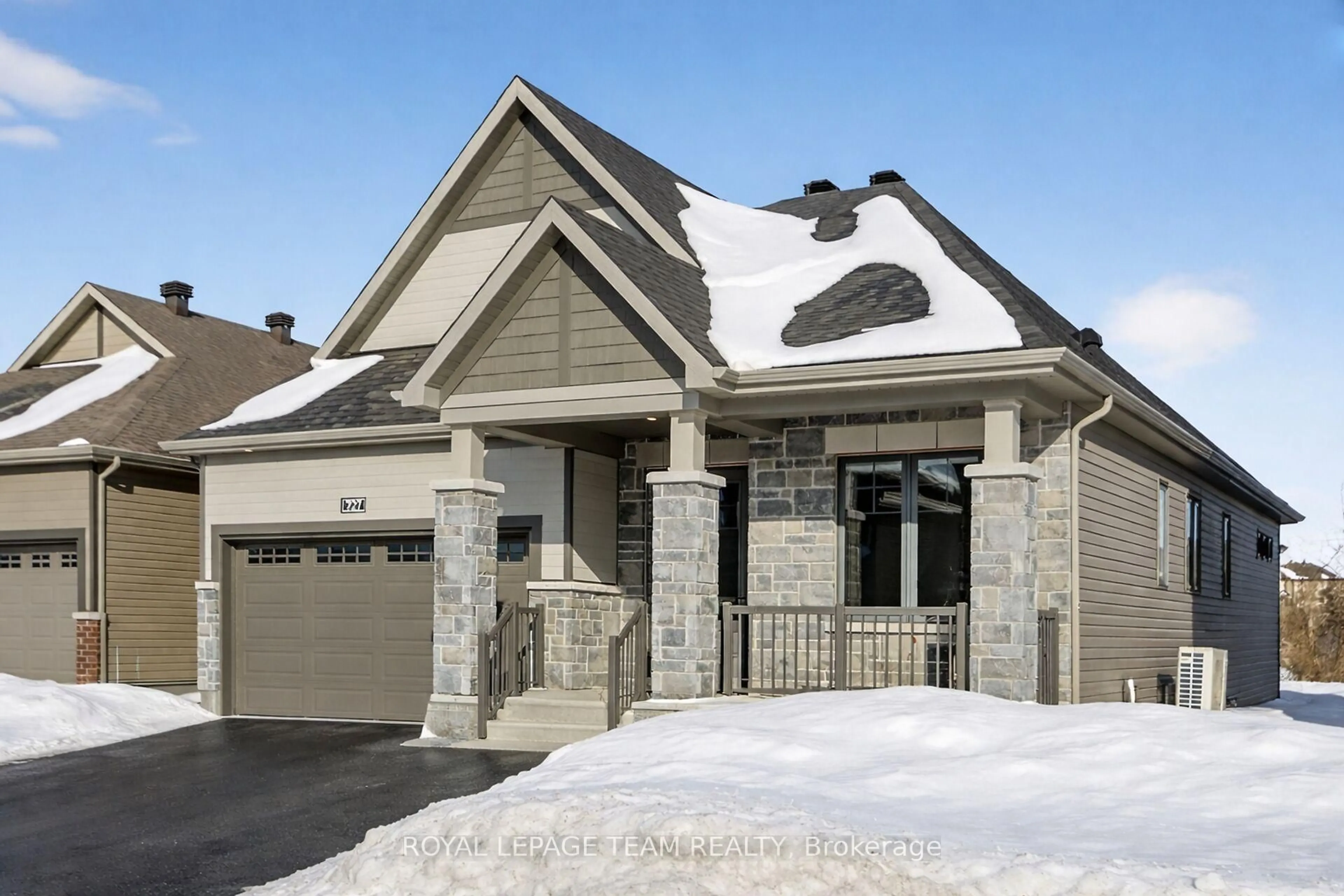 Home with brick exterior material, street for 727 Coast Circ, Manotick Ontario K4M 0N2