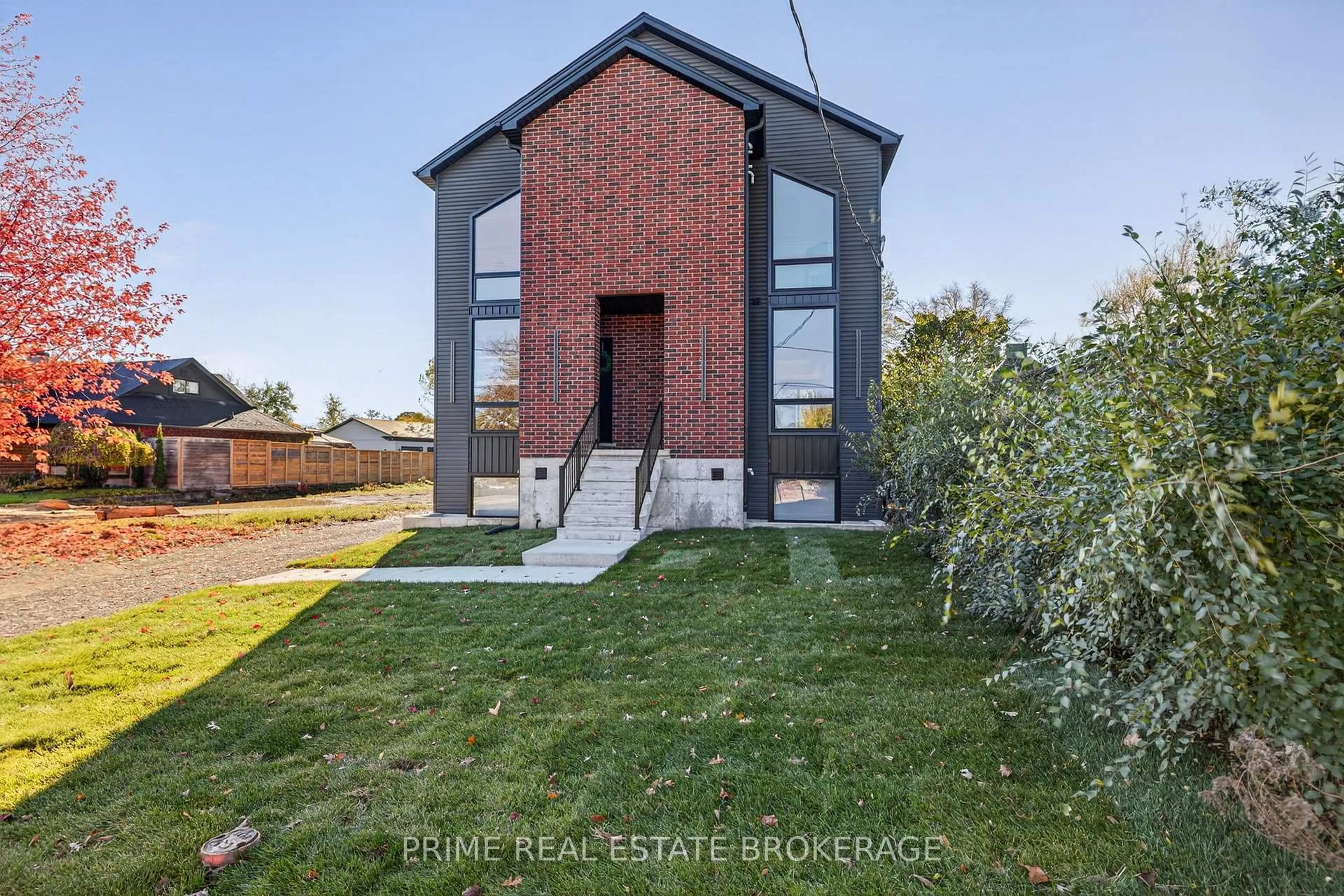 Home with brick exterior material, street for 417 Baseline Rd, London South Ontario N6C 2P5