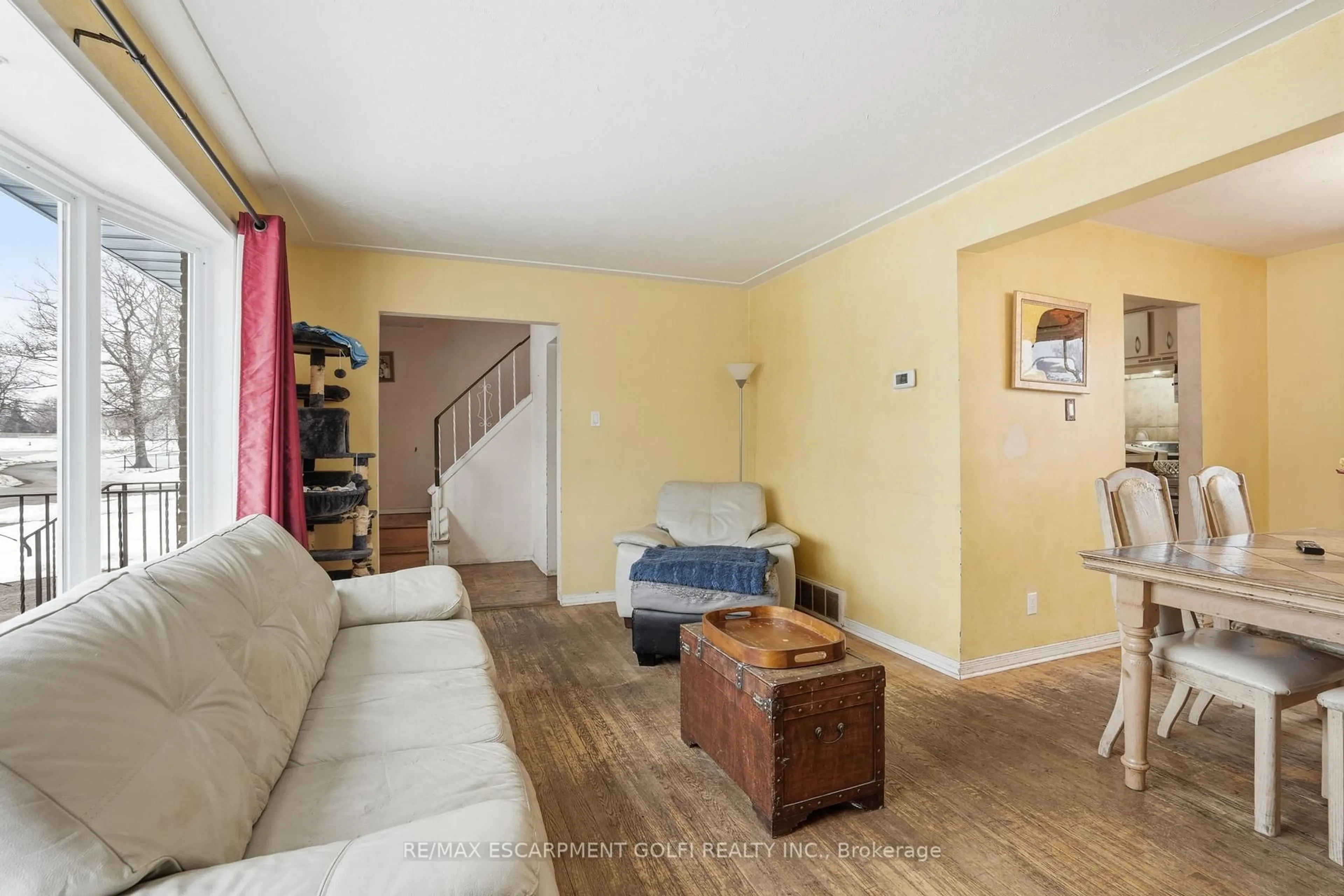 Living room with furniture, unknown for 56 Purnell Dr, Hamilton Ontario L9C 4Y3