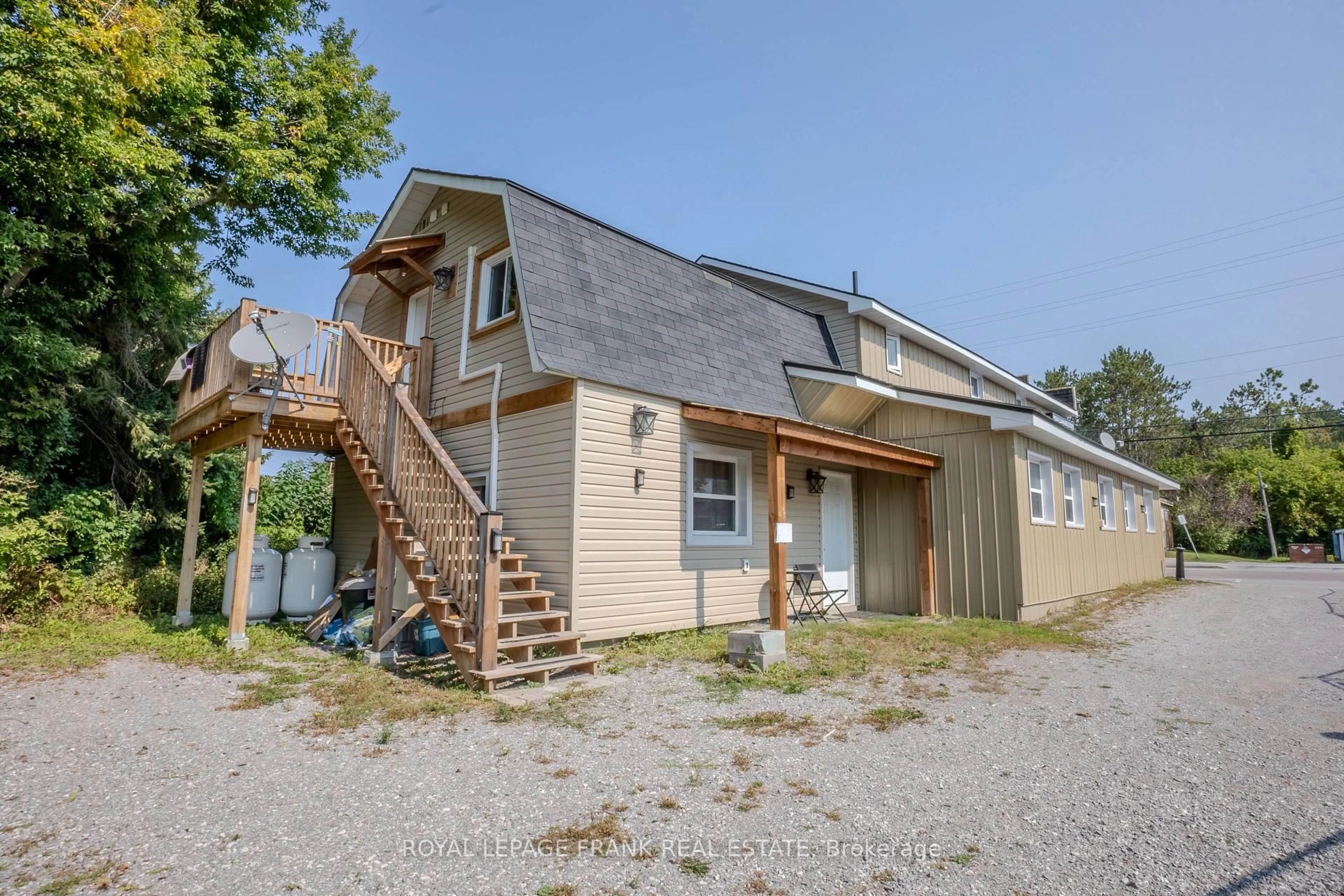 A pic from outside/outdoor area/front of a property/back of a property/a pic from drone, street for 4075 County Rd 121, Kawartha Lakes Ontario K0M 2A0