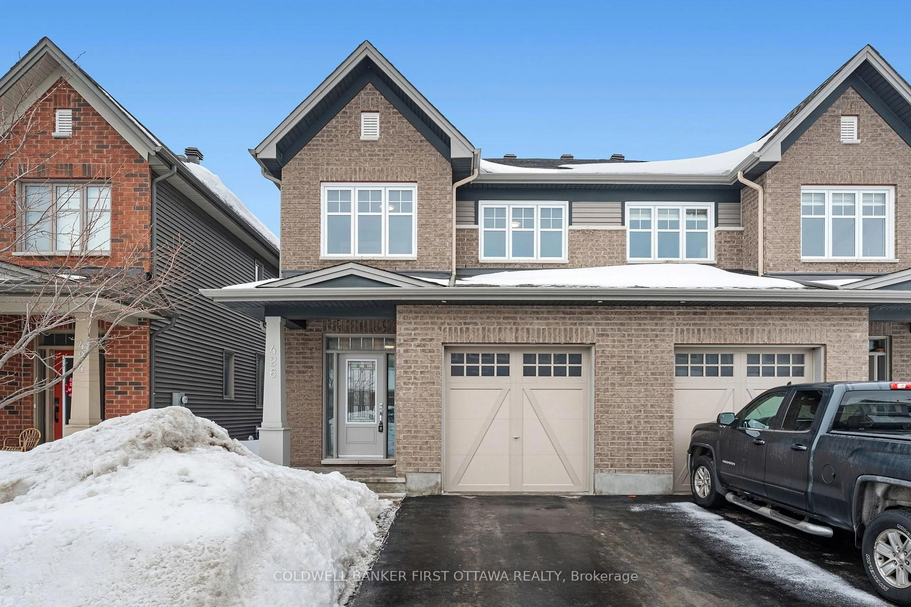 Home with brick exterior material, street for 426 WARMSTONE Dr, Stittsville Ontario K2S 0W2