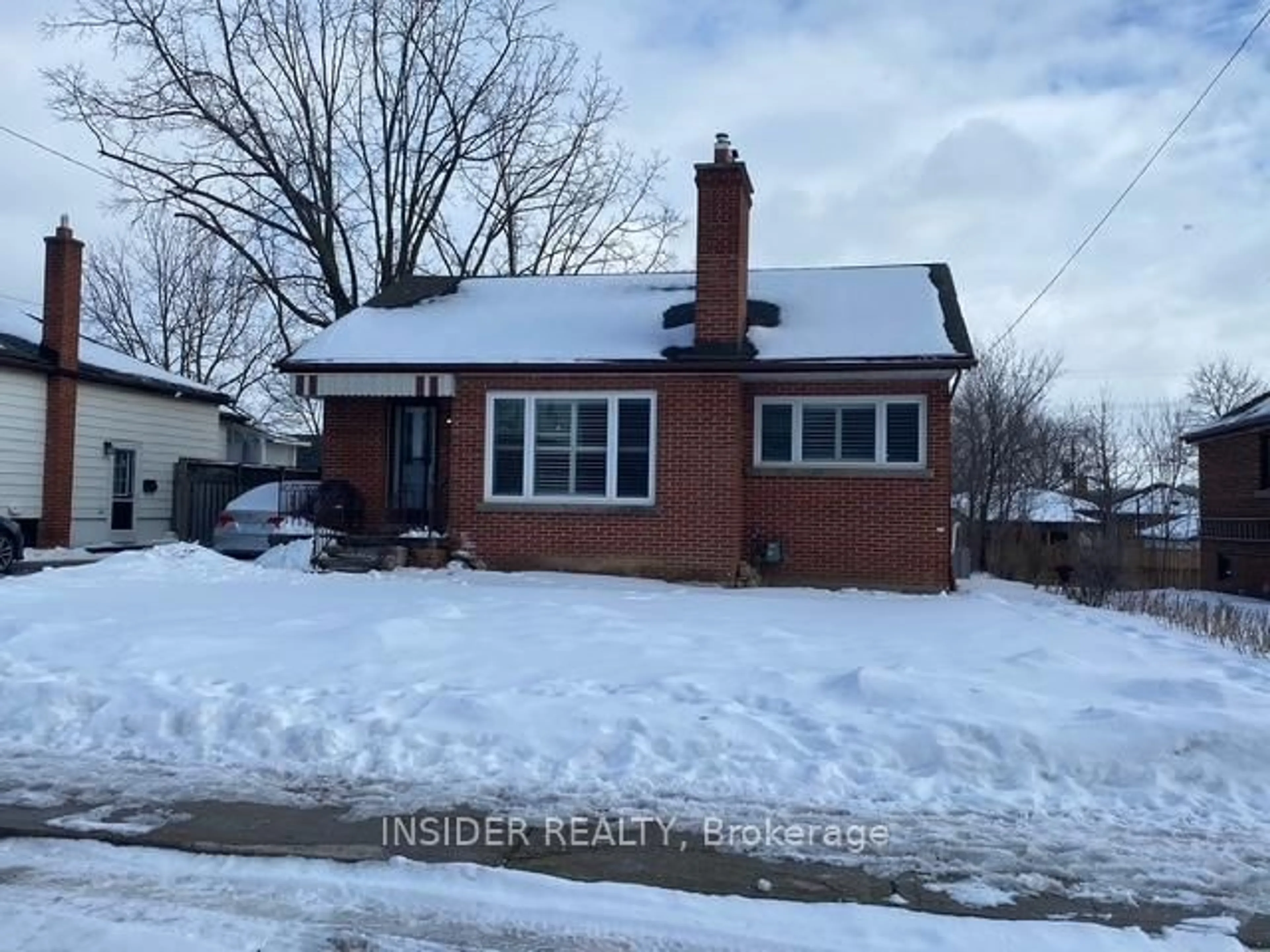 Home with brick exterior material, street for 205 Stewartdale Ave, Hamilton Ontario L8K 4P7