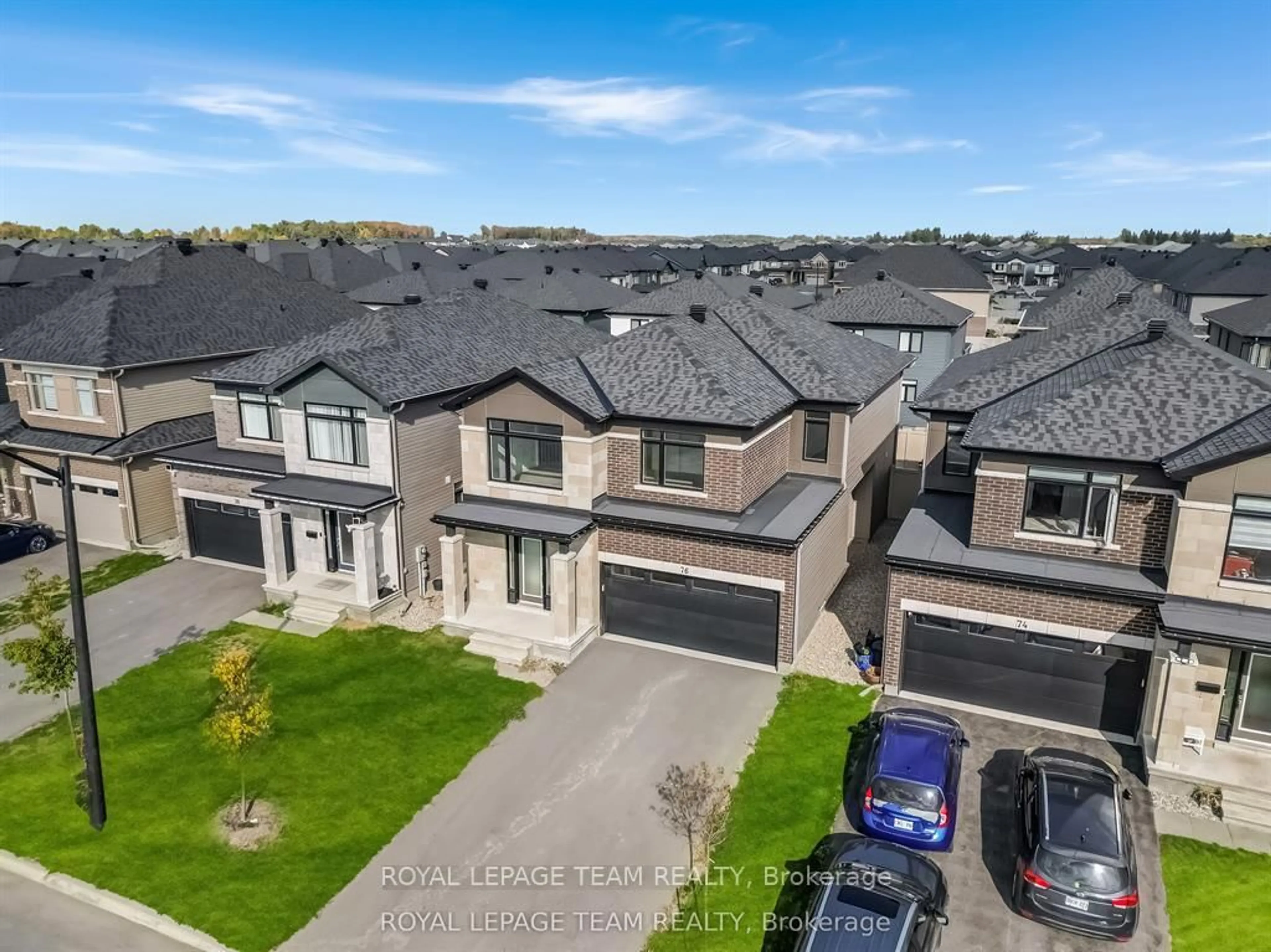 A pic from outside/outdoor area/front of a property/back of a property/a pic from drone, street for 76 Big Dipper St, Ottawa Ontario K4M 0L8