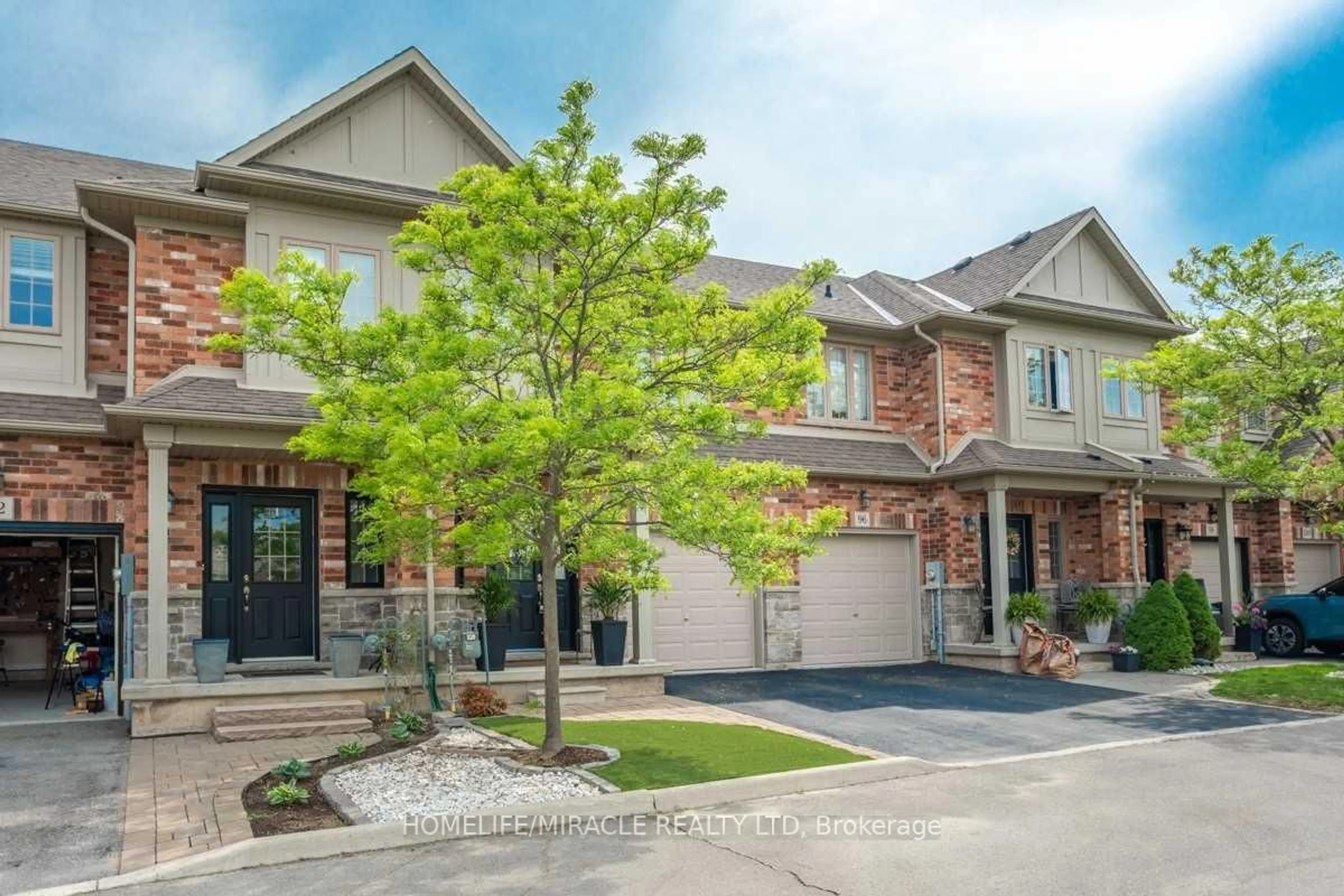 Home with brick exterior material, street for 94 Fall Fair Way, Hamilton Ontario L0R 1C0