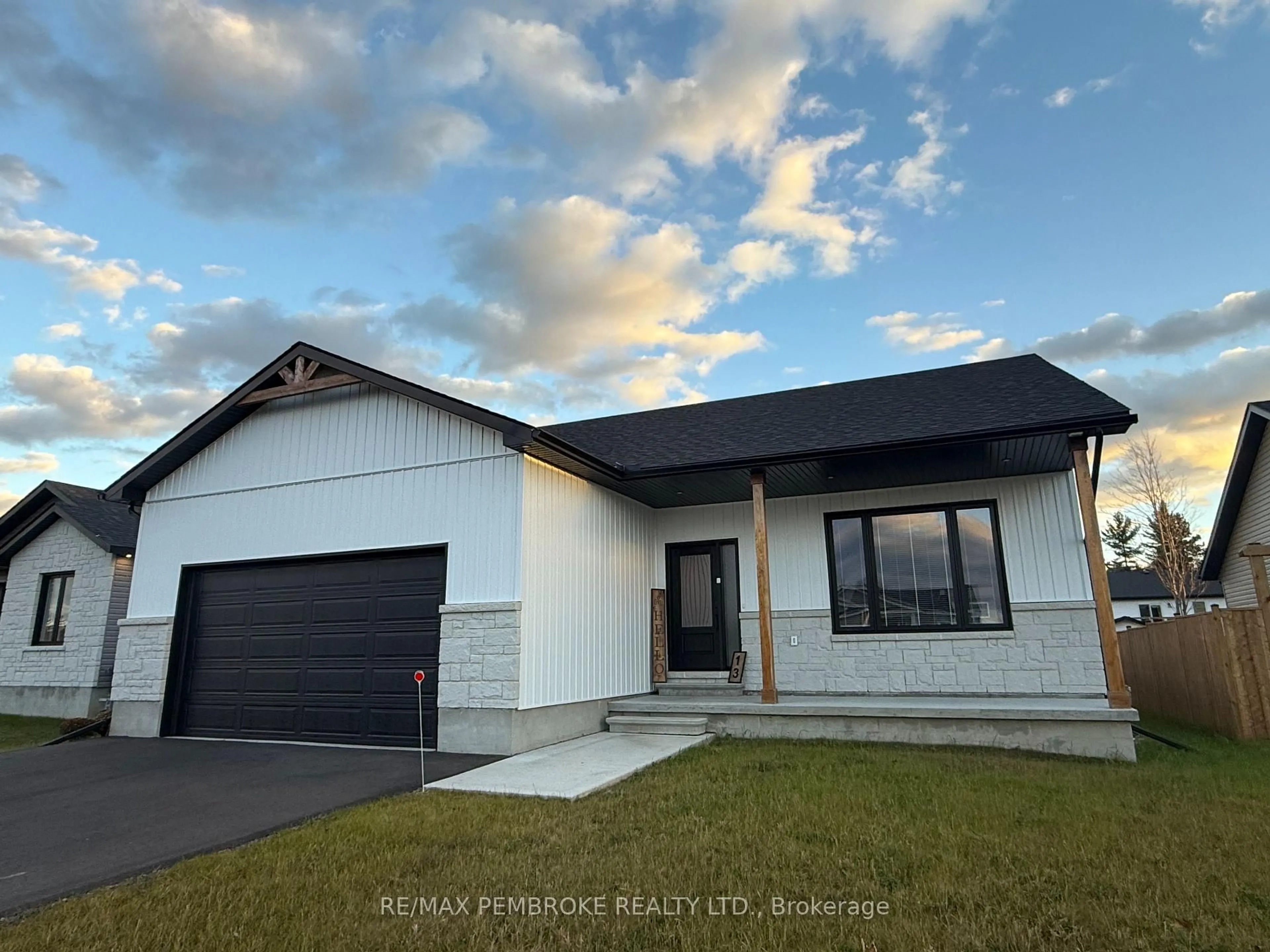 Home with vinyl exterior material, street for 18 Durant St, Petawawa Ontario K8H 0G2