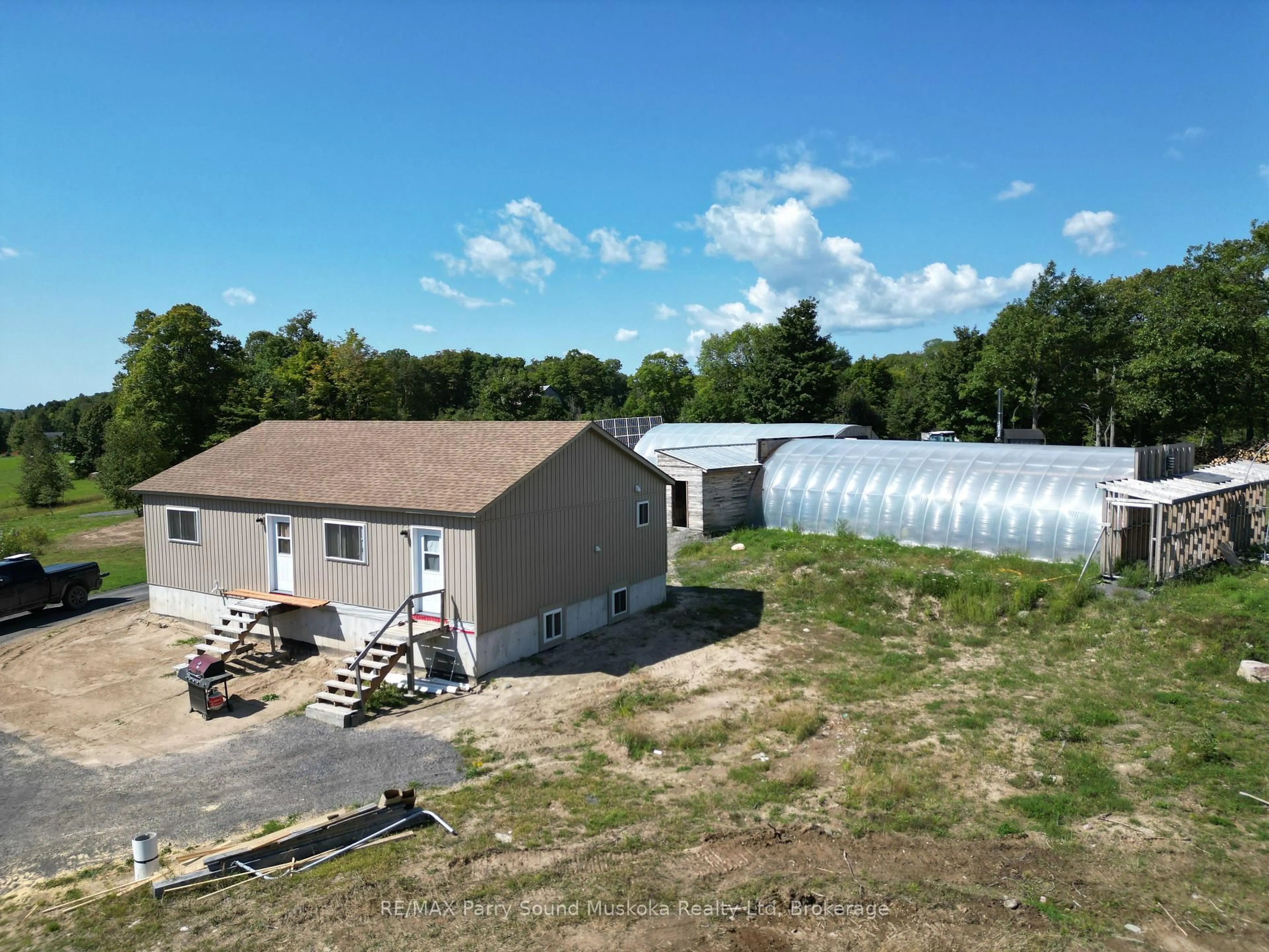 A pic from outside/outdoor area/front of a property/back of a property/a pic from drone, building for 791 Clear Lake Rd, Parry Sound Remote Area Ontario P0H 1A0