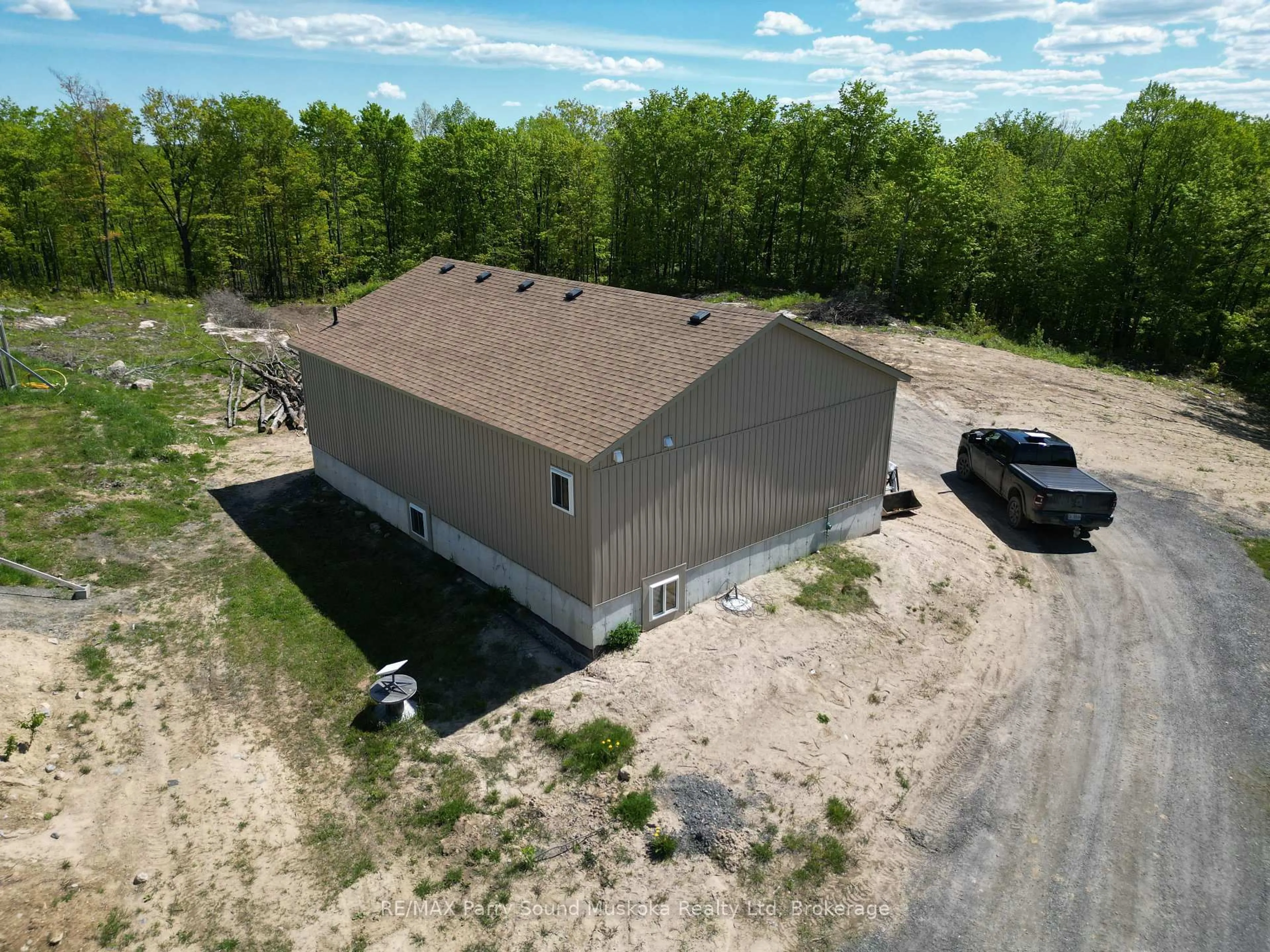 A pic from outside/outdoor area/front of a property/back of a property/a pic from drone, building for 791 Clear Lake Rd, Parry Sound Remote Area Ontario P0H 1A0
