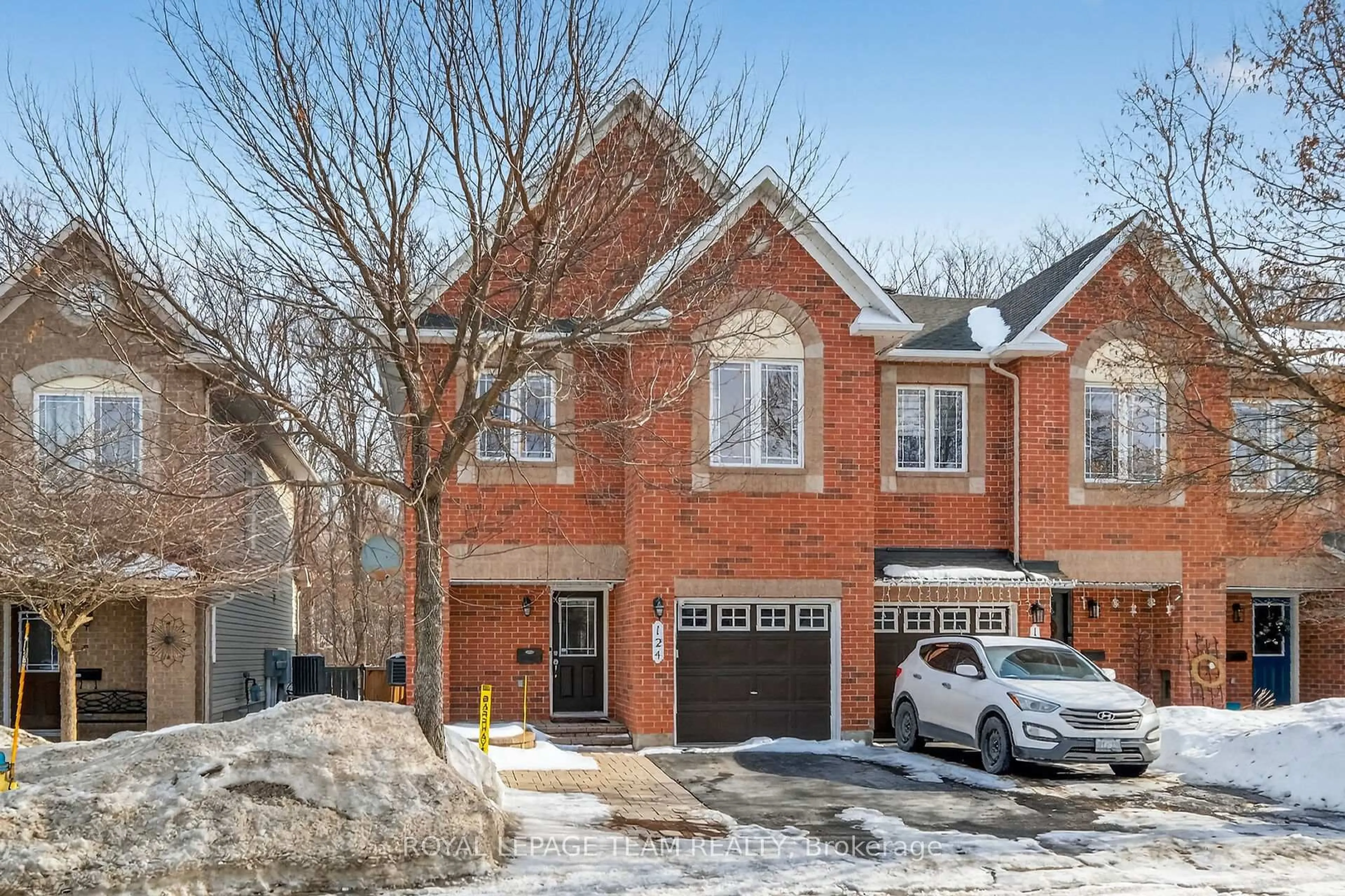 Home with brick exterior material, street for 124 Tacom Circ, Ottawa Ontario K2G 4P8