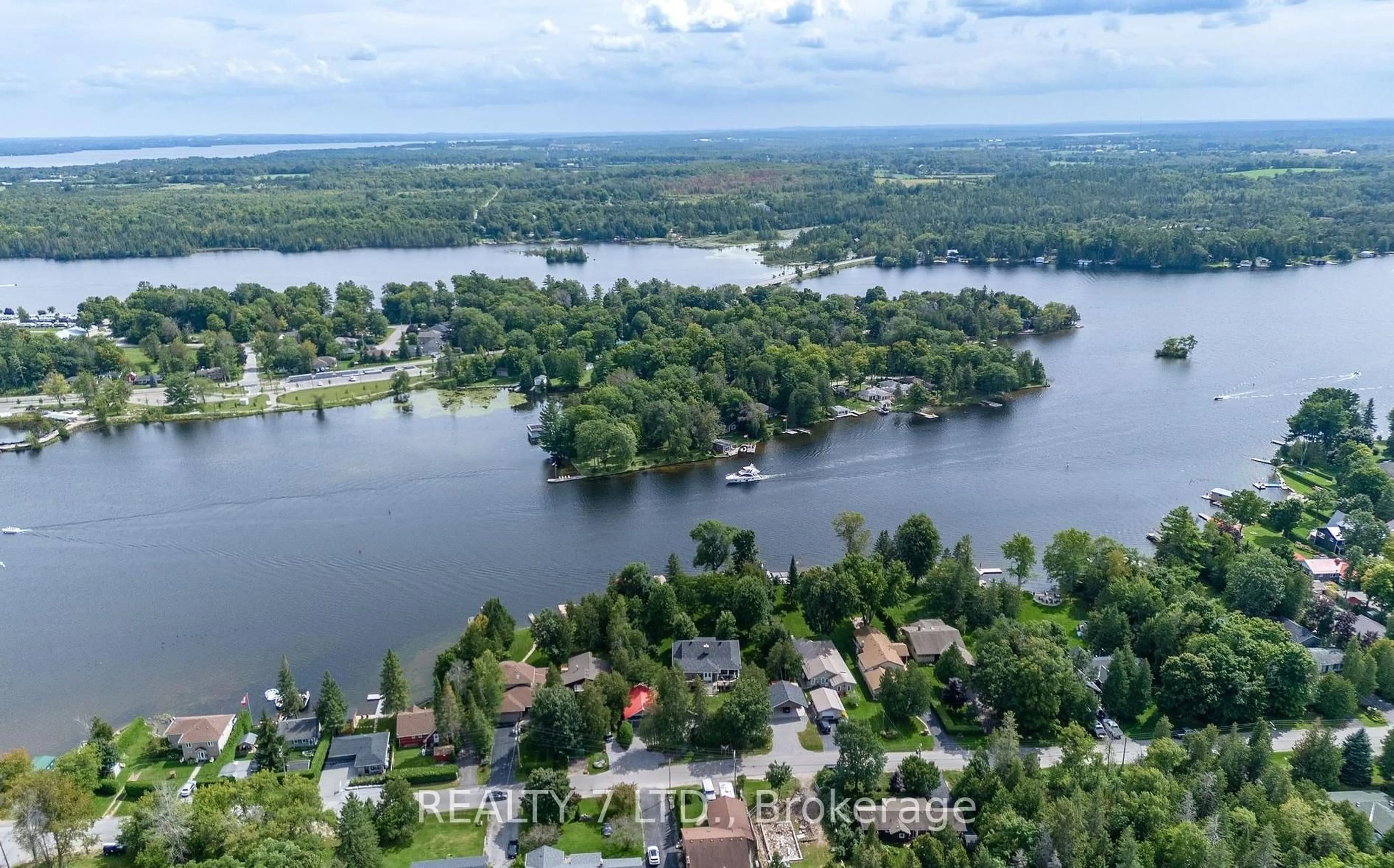 A pic from outside/outdoor area/front of a property/back of a property/a pic from drone, water/lake/river/ocean view for 31 Hillcroft Way, Kawartha Lakes Ontario K0M 1A0