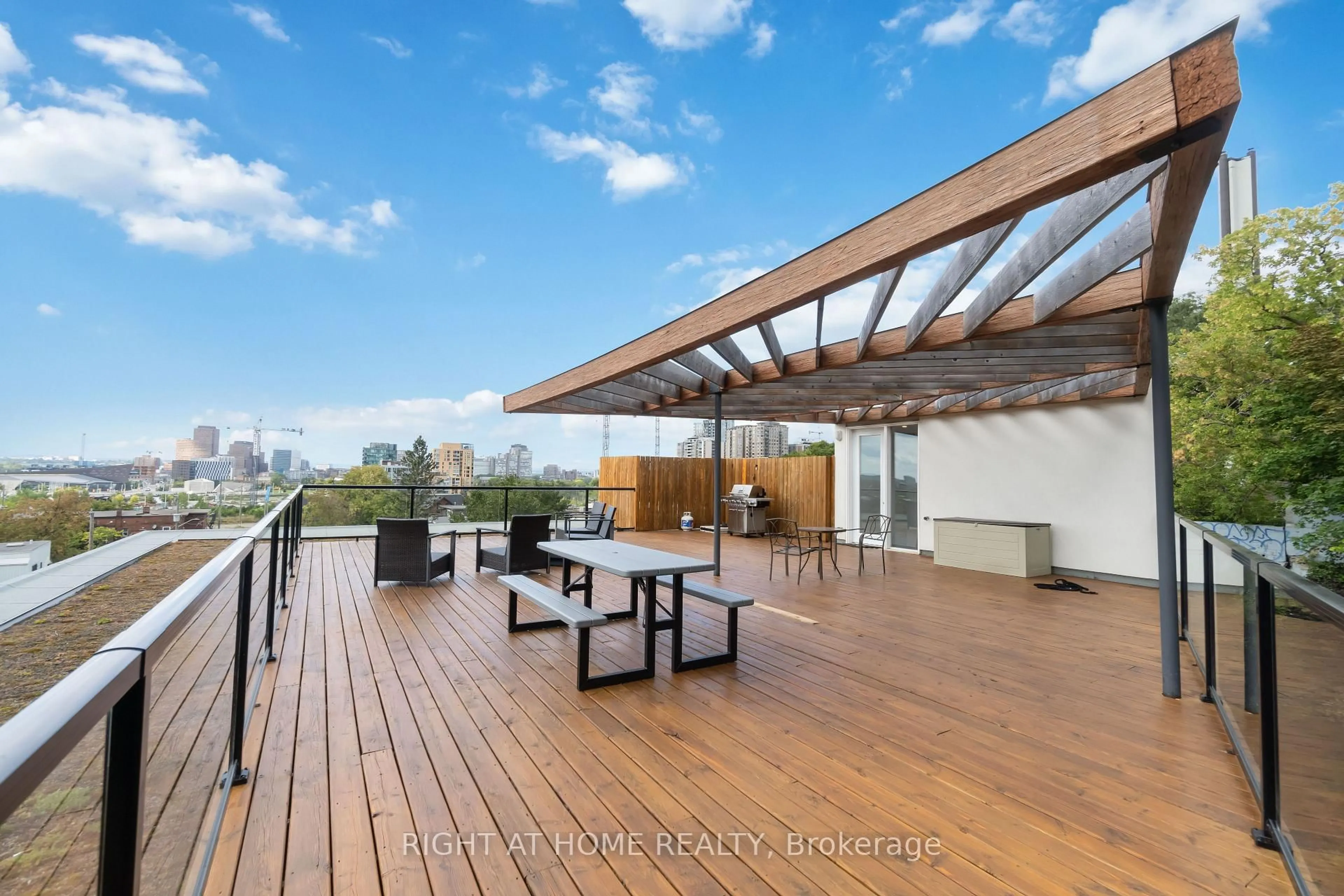 Patio, city buildings view from balcony for 22 Perkins St #305, Ottawa Ontario K1R 7G5