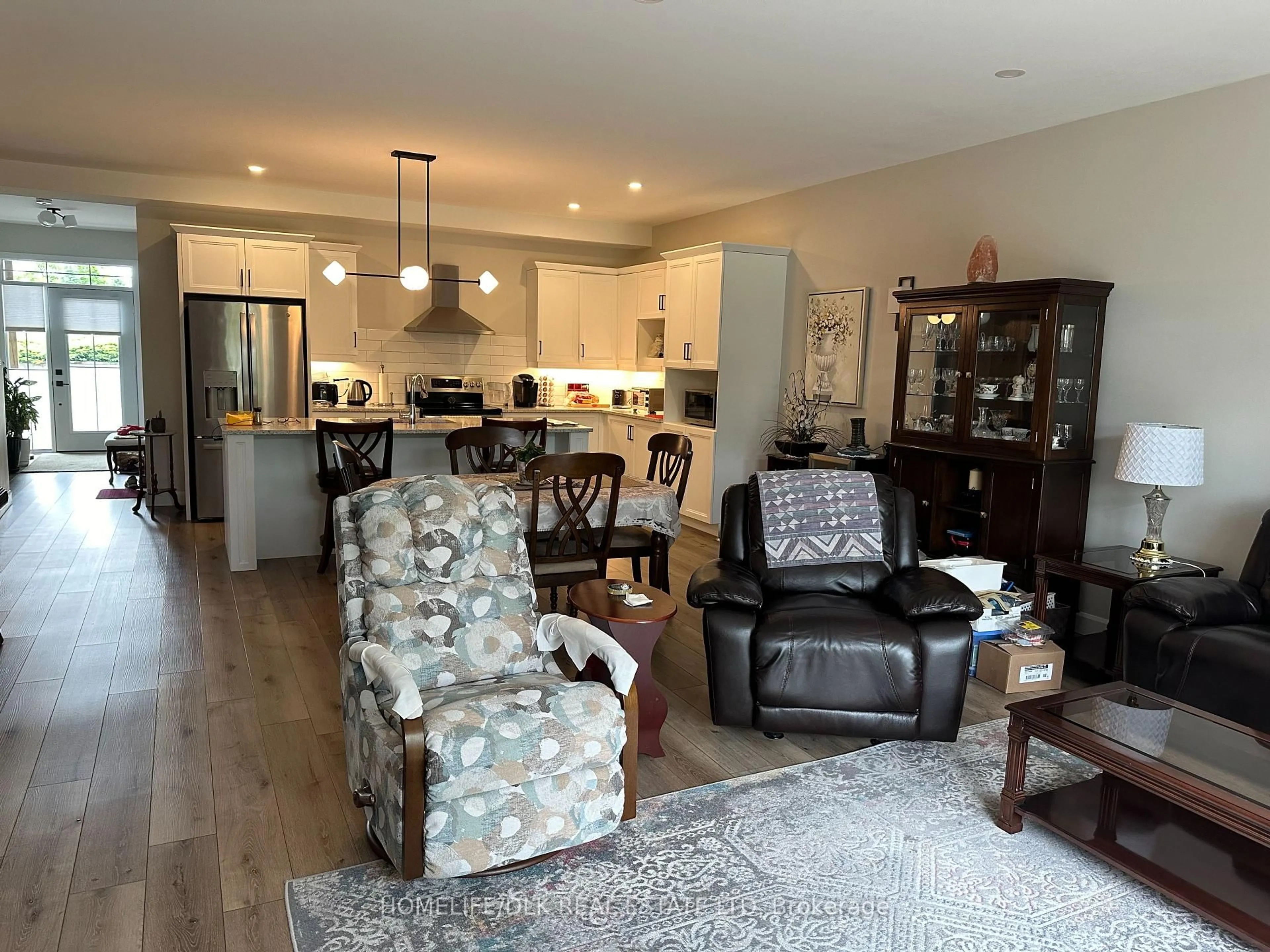 Open concept kitchen, wood/laminate floor for 1115 Millwood Ave, Brockville Ontario K6V 0E6