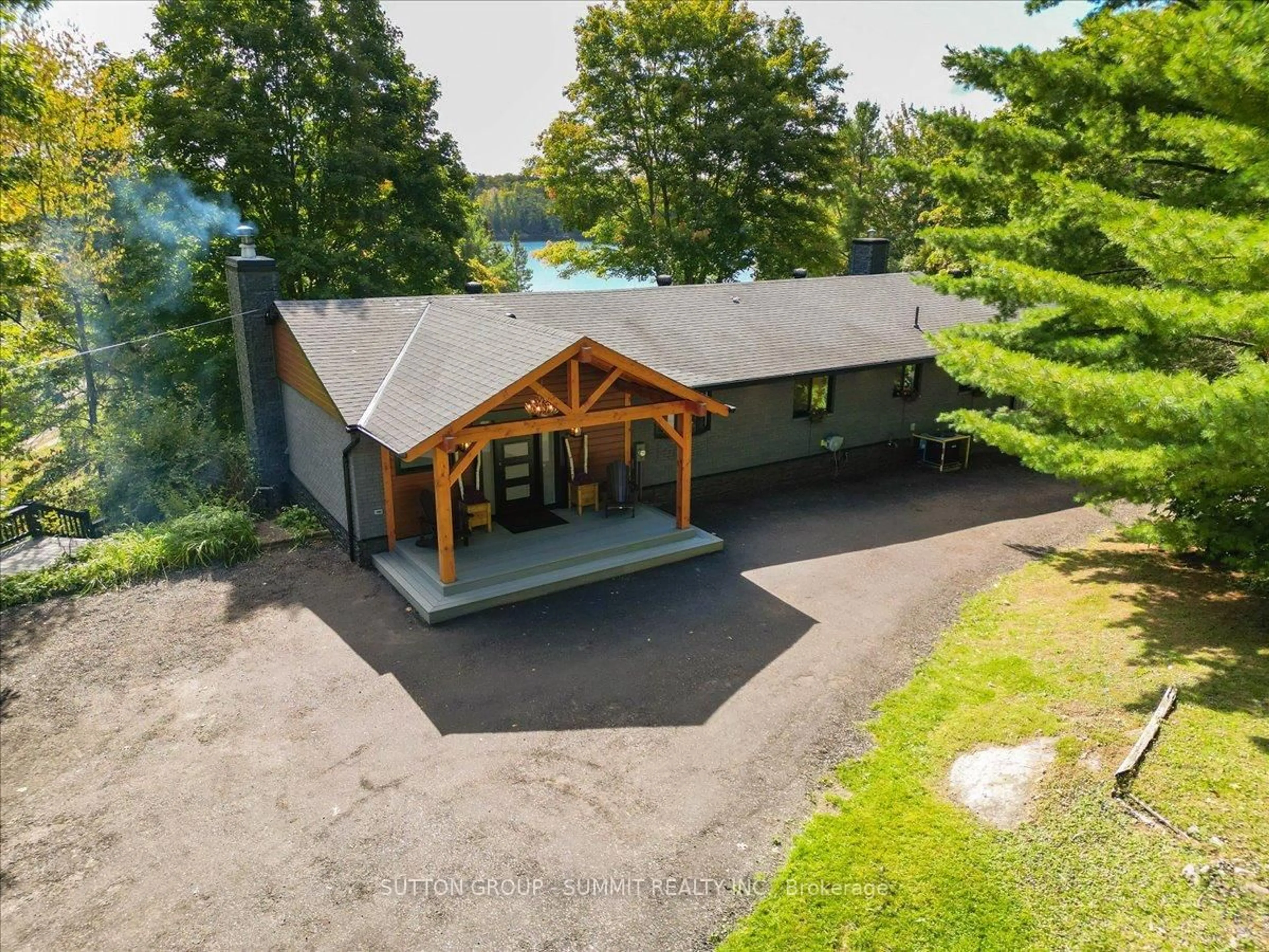 A pic from outside/outdoor area/front of a property/back of a property/a pic from drone, water/lake/river/ocean view for 1 WINDY Lane, McDougall Ontario P2A 2W9