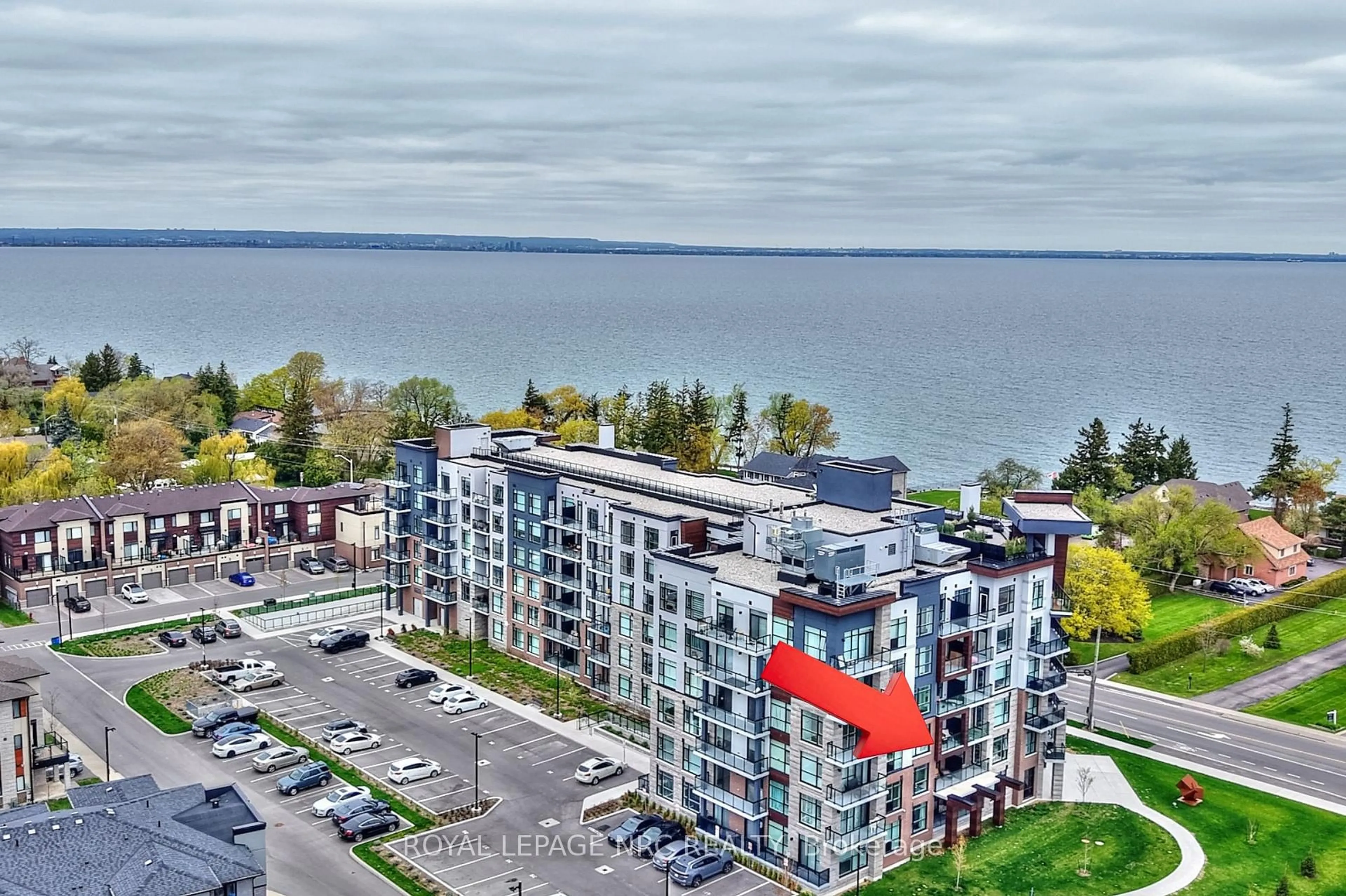 A pic from outside/outdoor area/front of a property/back of a property/a pic from drone, water/lake/river/ocean view for 600 North Service Rd #221, Hamilton Ontario L8E 0L2