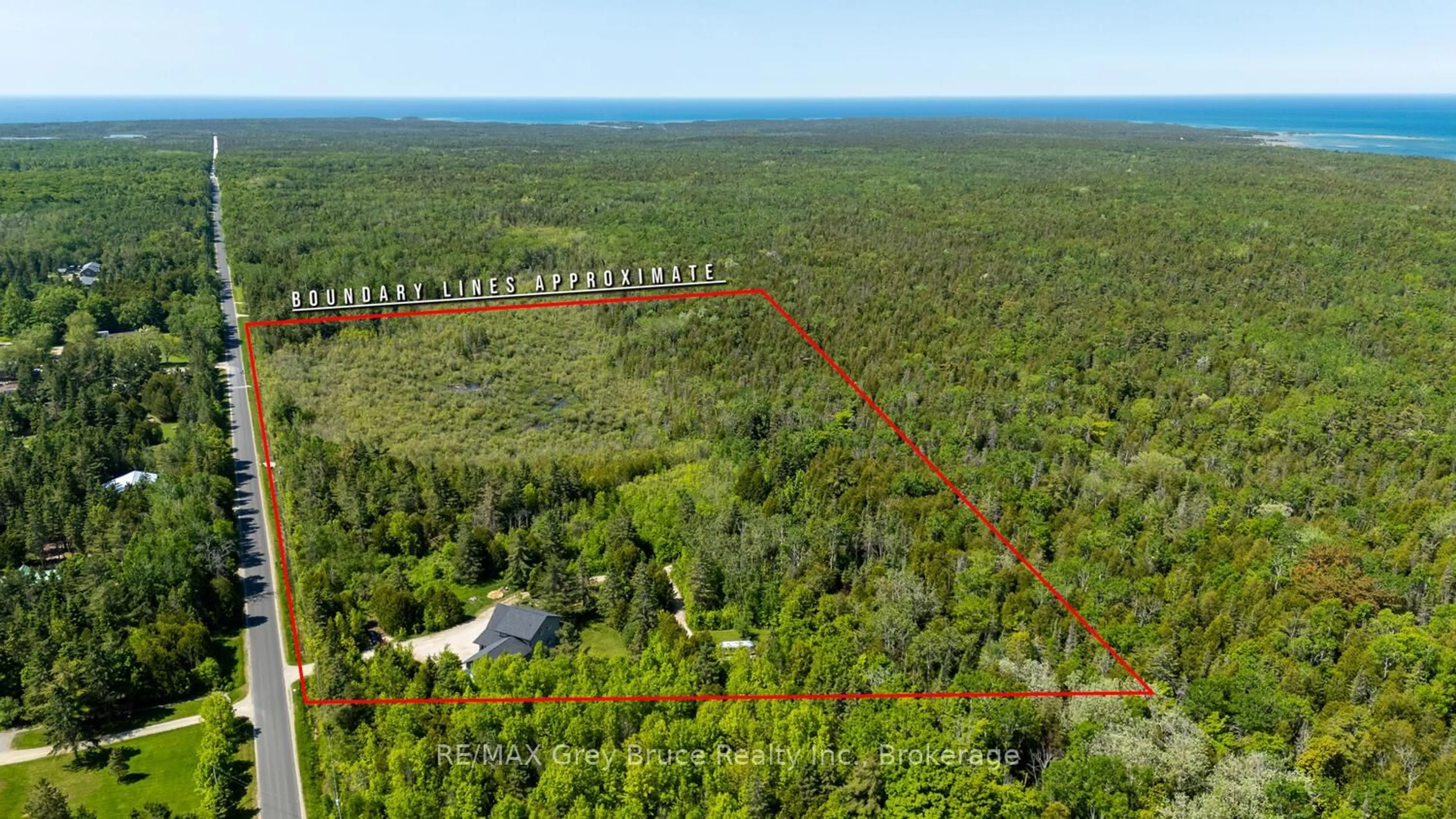 A pic from outside/outdoor area/front of a property/back of a property/a pic from drone, forest/trees view for 62 Cape Hurd Rd, Northern Bruce Peninsula Ontario N0H 2R0