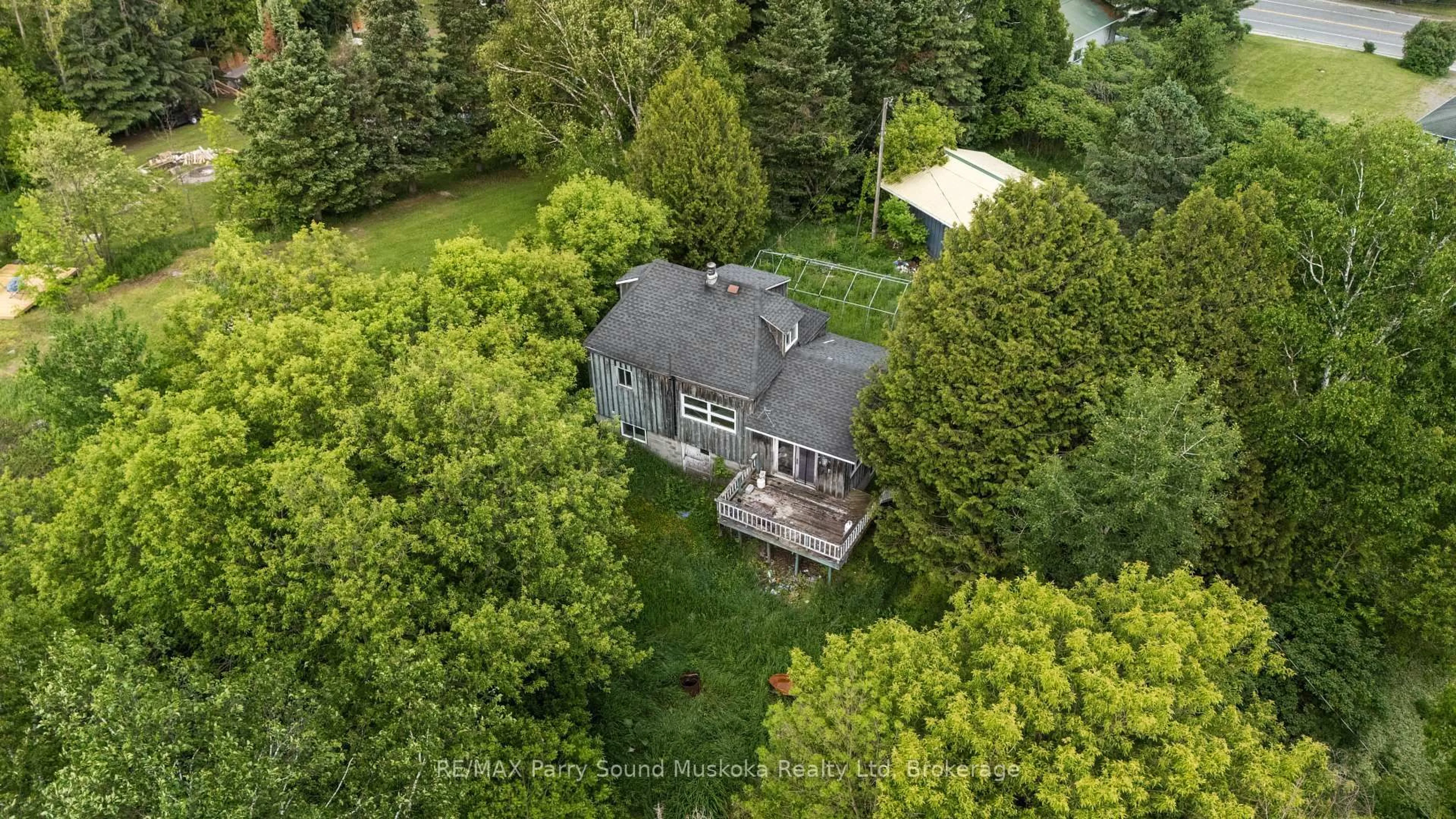 A pic from outside/outdoor area/front of a property/back of a property/a pic from drone, unknown for 5 Bellview Cres, Whitestone Ontario P0A 1G0
