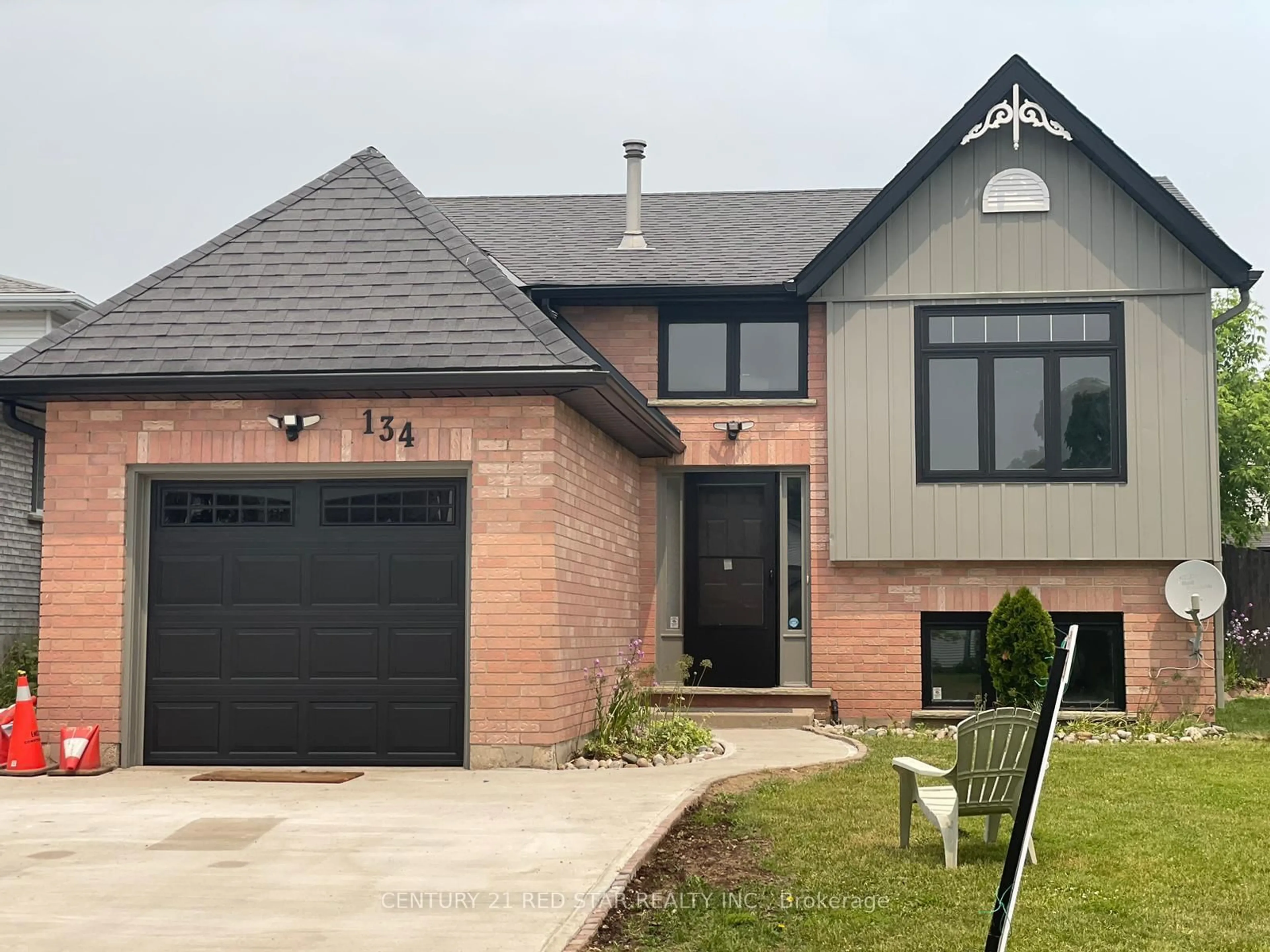 Home with brick exterior material, street for 134 Bankside Dr, Kitchener Ontario N2N 3E2