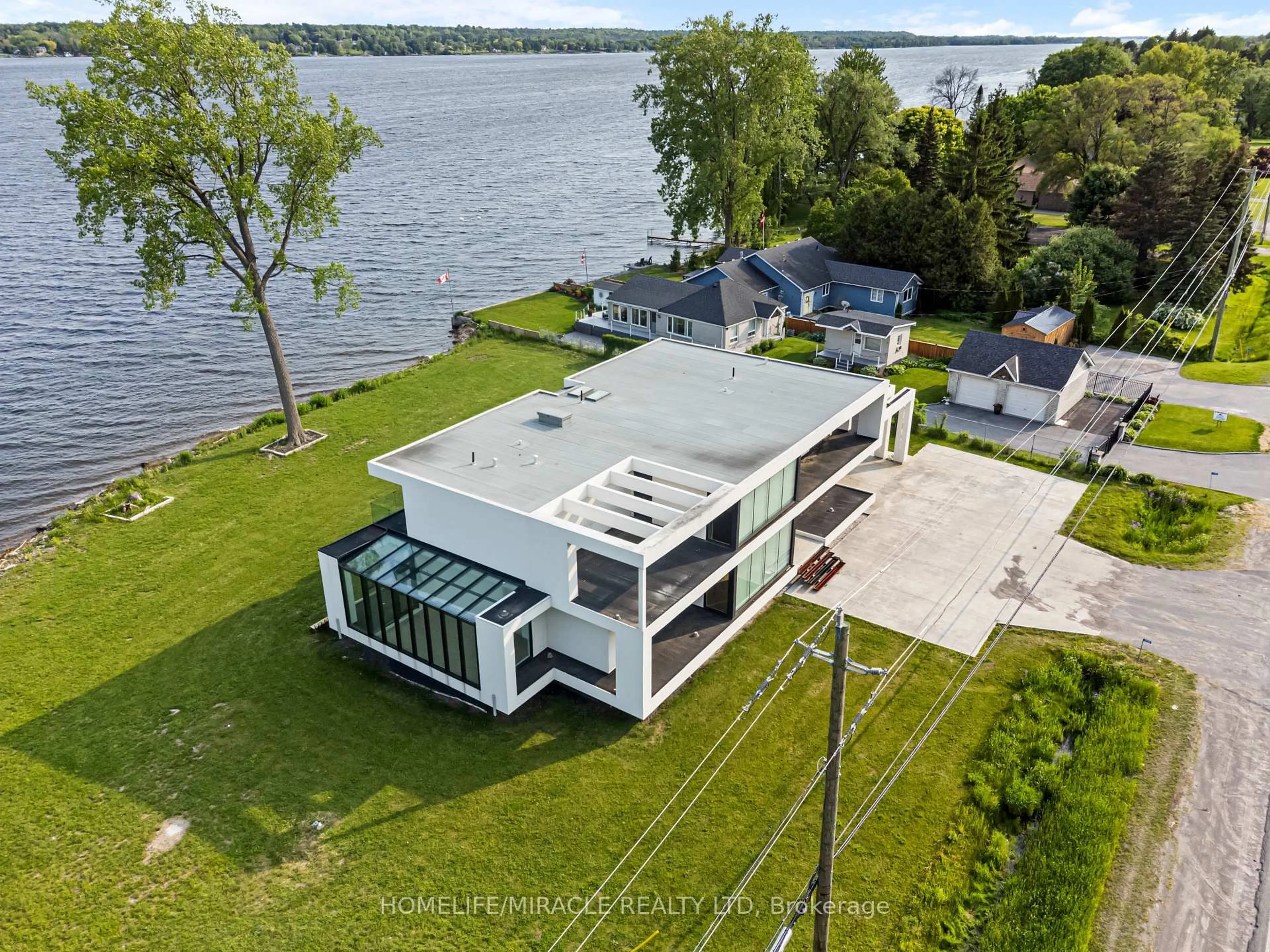 A pic from outside/outdoor area/front of a property/back of a property/a pic from drone, water/lake/river/ocean view for 1722 Old Highway 2, Belleville Ontario K8N 4Z2